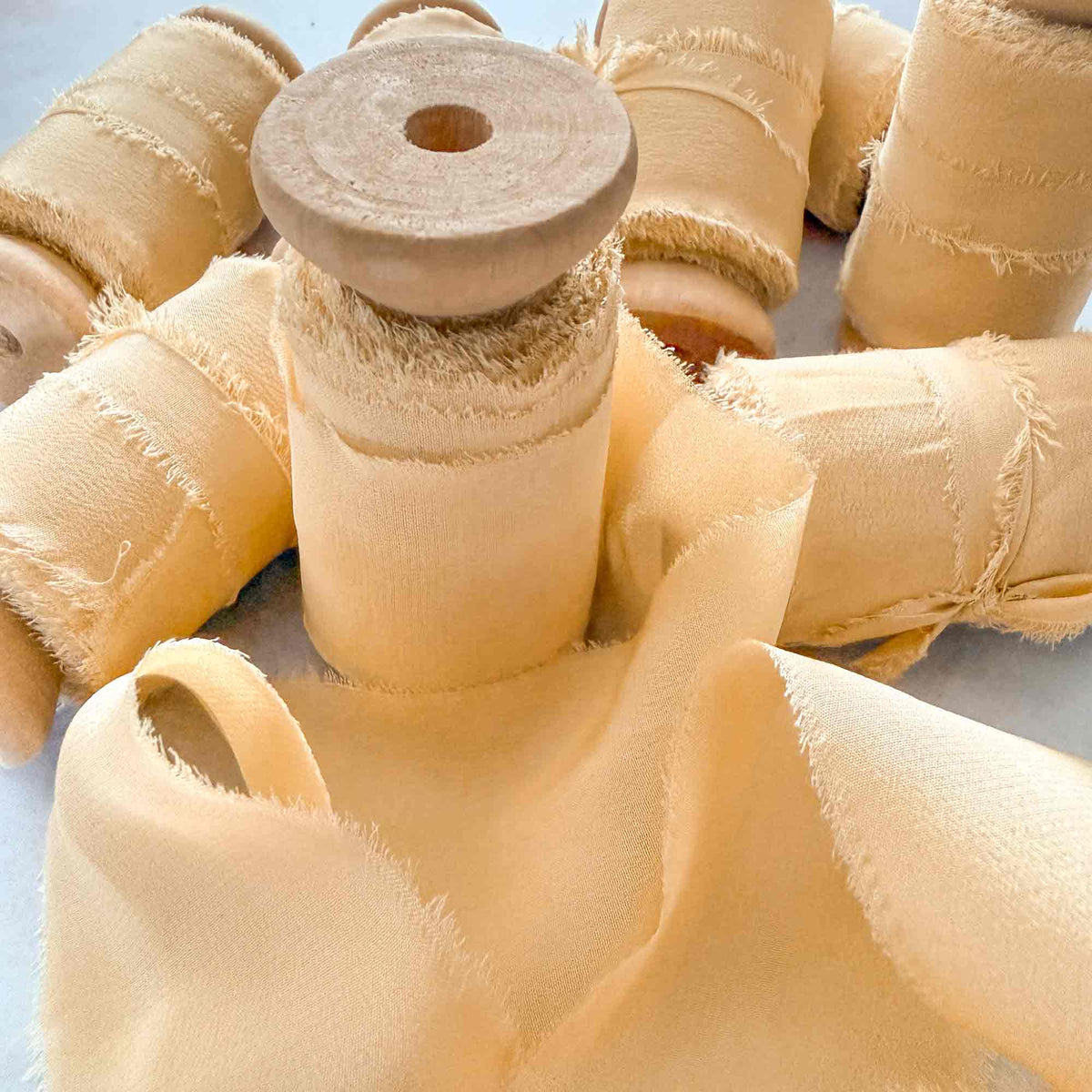 Raw edge Buttermilk silk ribbon with soft natural texture