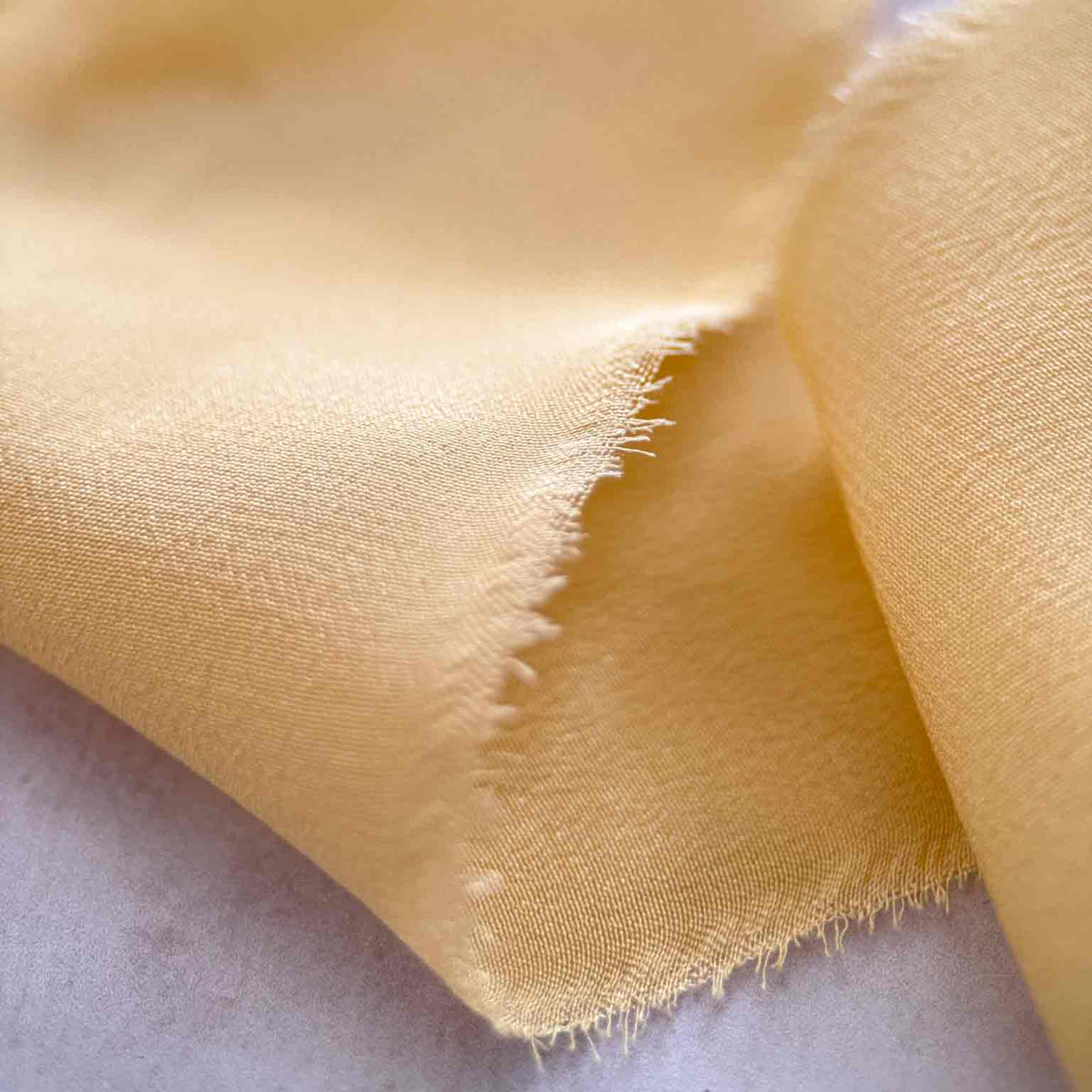 Creamy yellow raw edge silk ribbon for floristry and gift wrapping