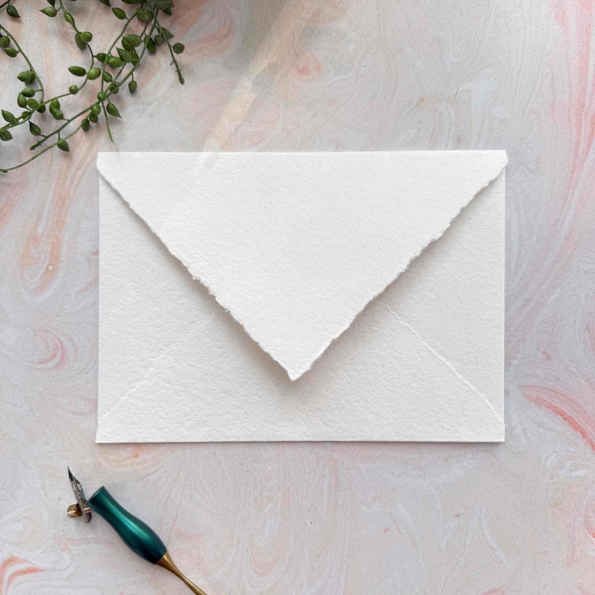 a5 handmade paper envelope with pointed flap and deckled edges