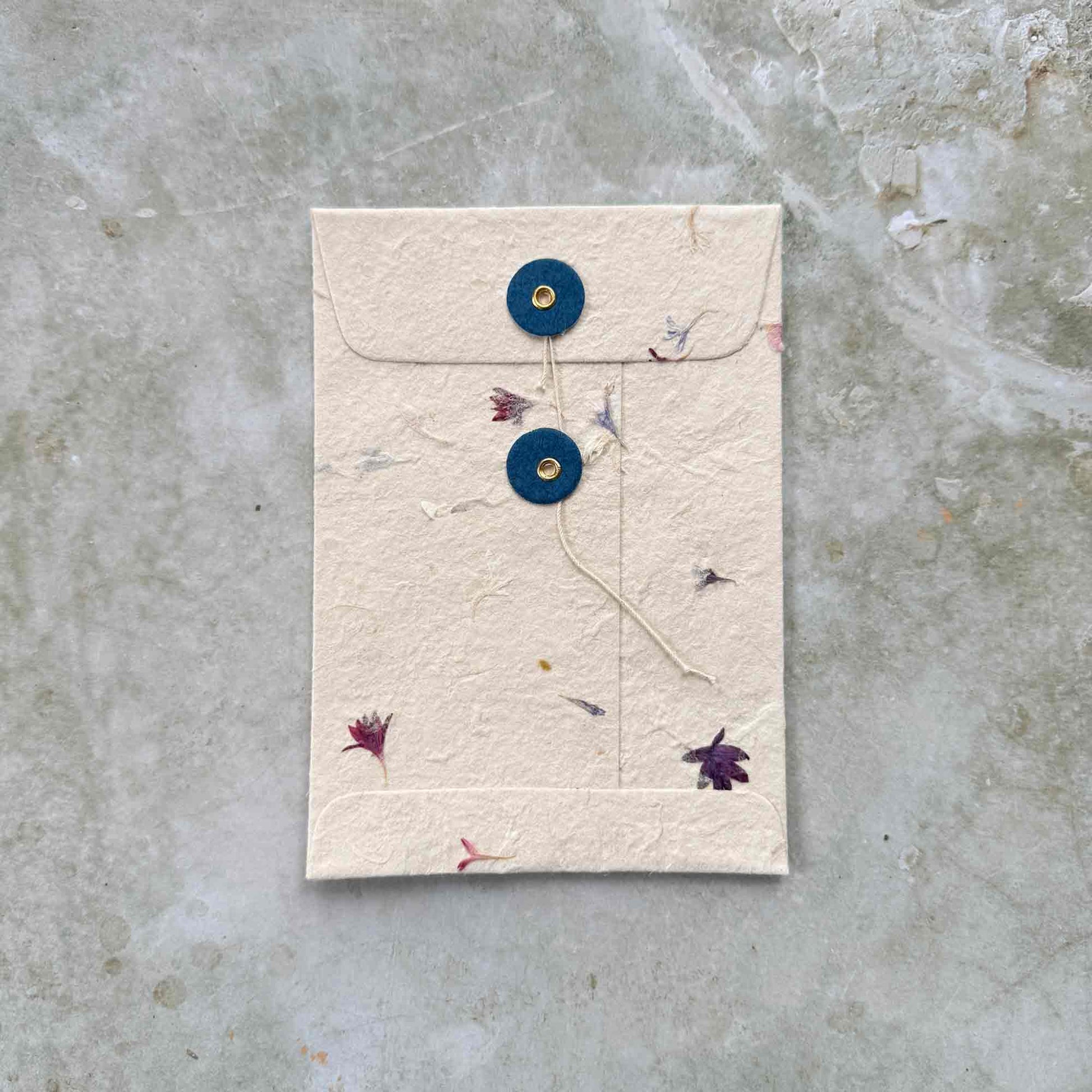 washer envelope made from handmade paper with cornflower petals