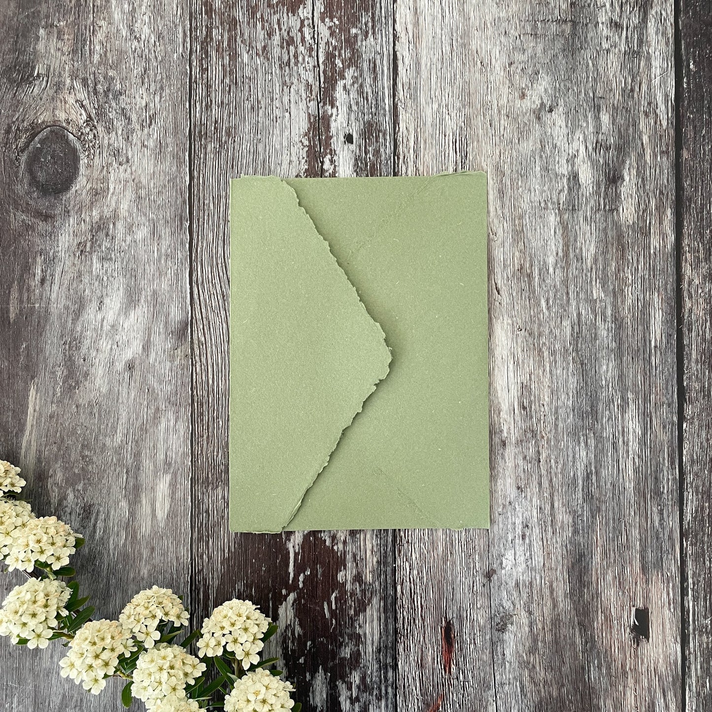 C6 invitation envelope handmade from recycled cotton rag paper with a deckled edge.  Sage green invitation envelope to fit a6 paper and card.  By The Natural Paper Company