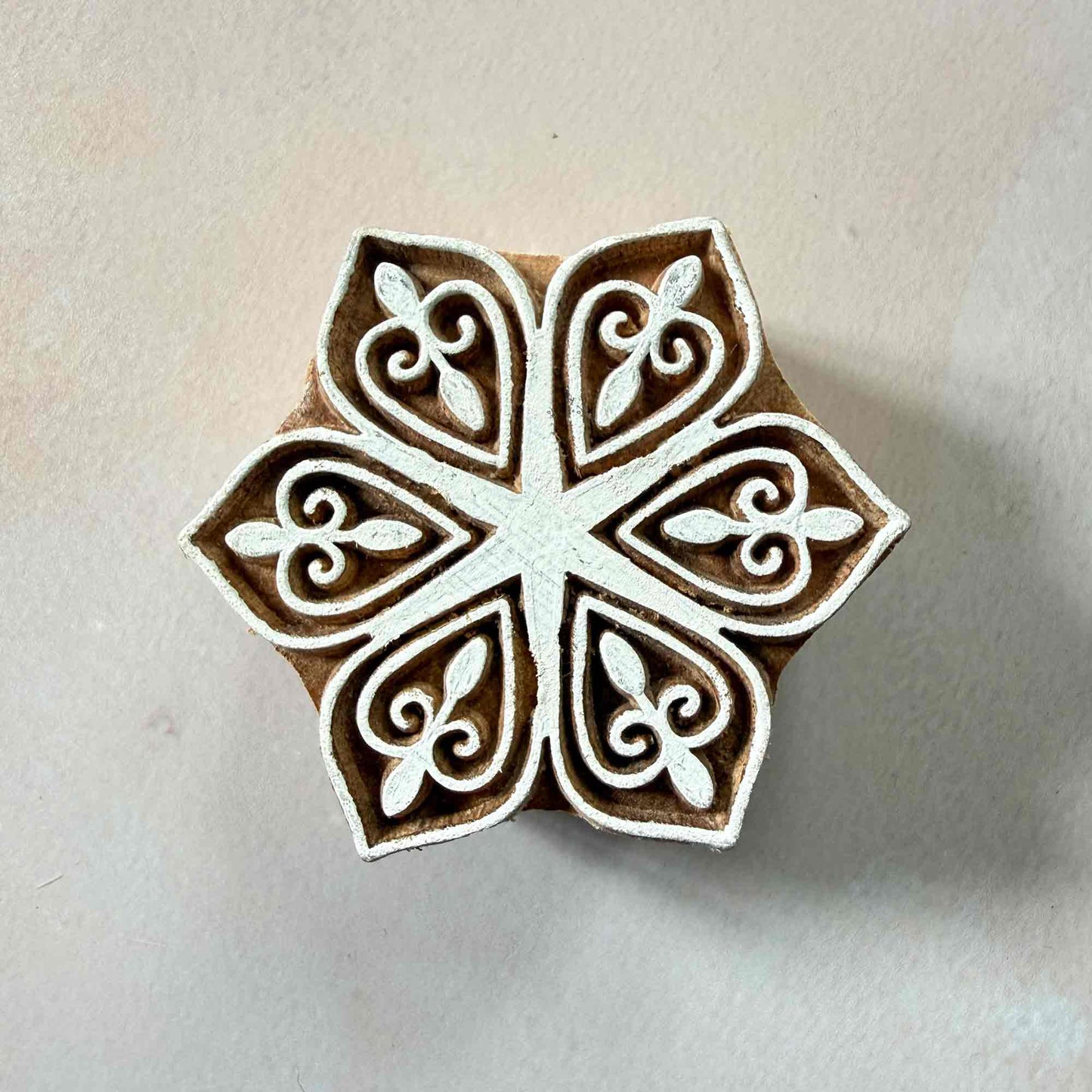 Decorative wooden stamp with intricate patterns 