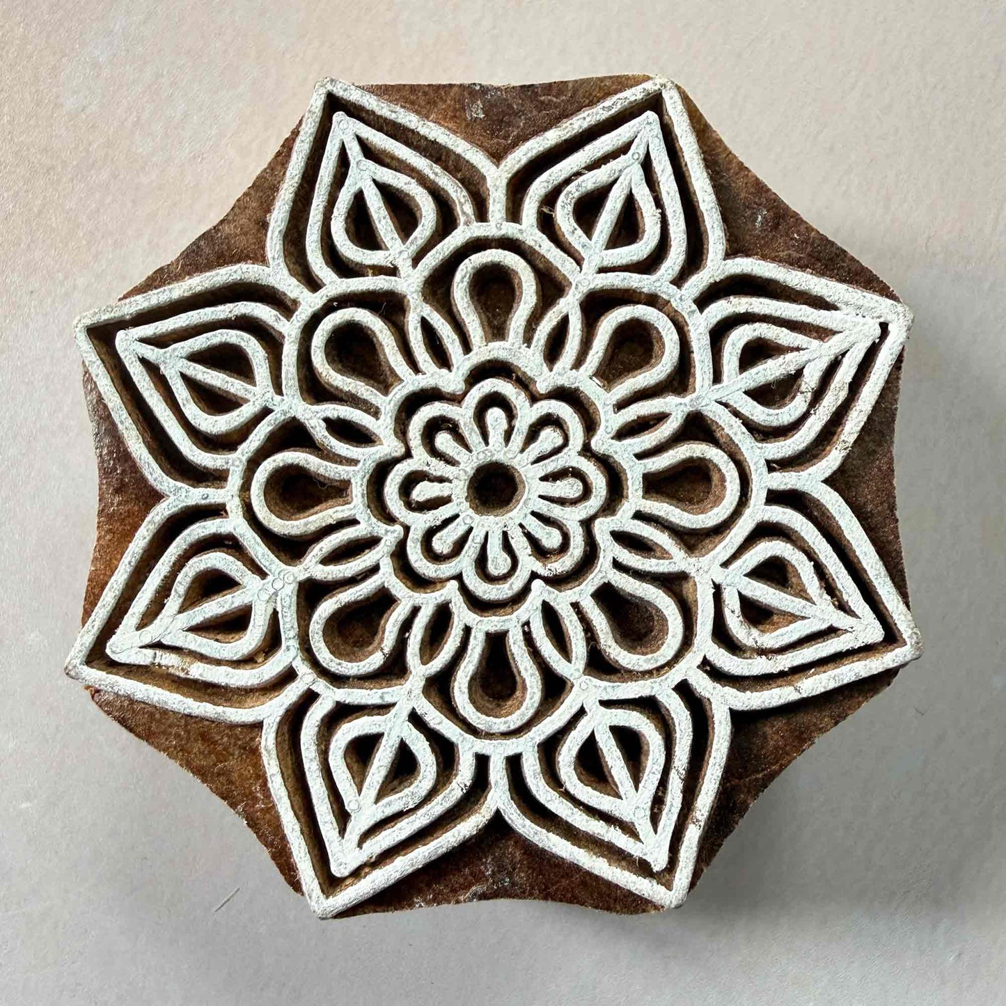intricate wooden stamp for block printing
