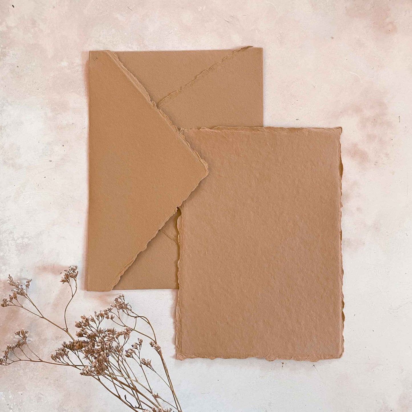 Clay handmade paper envelope with deckled edges.  Mink Brown Colour recycled paper by The Natural Paper Company