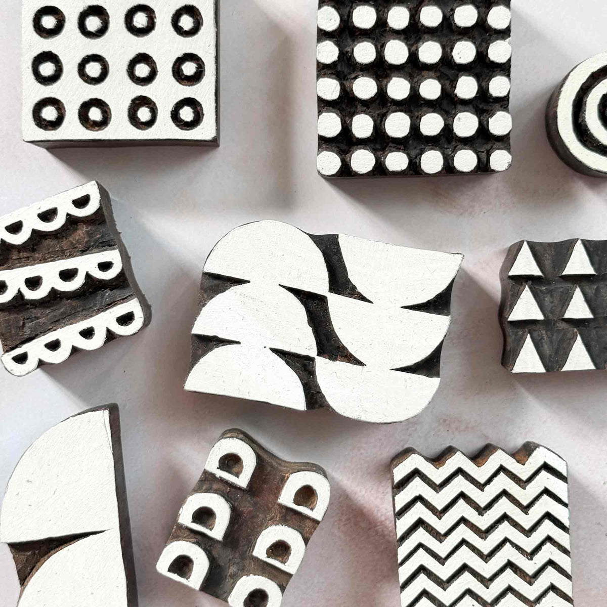 a set of Indian wood block stamps with geometric patterns