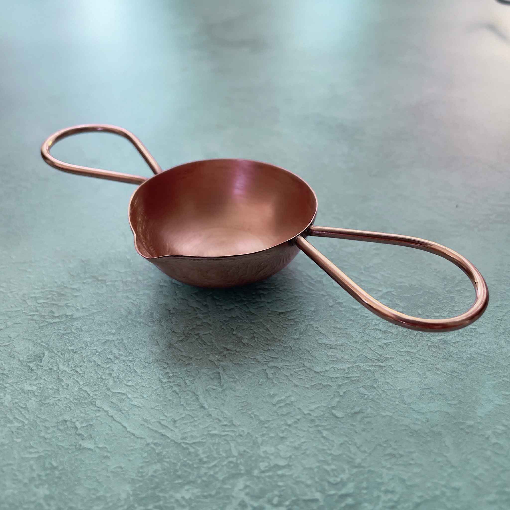 Large sealing wax spoon in copper.  Double handle spoon to use with a candle and sealing wax