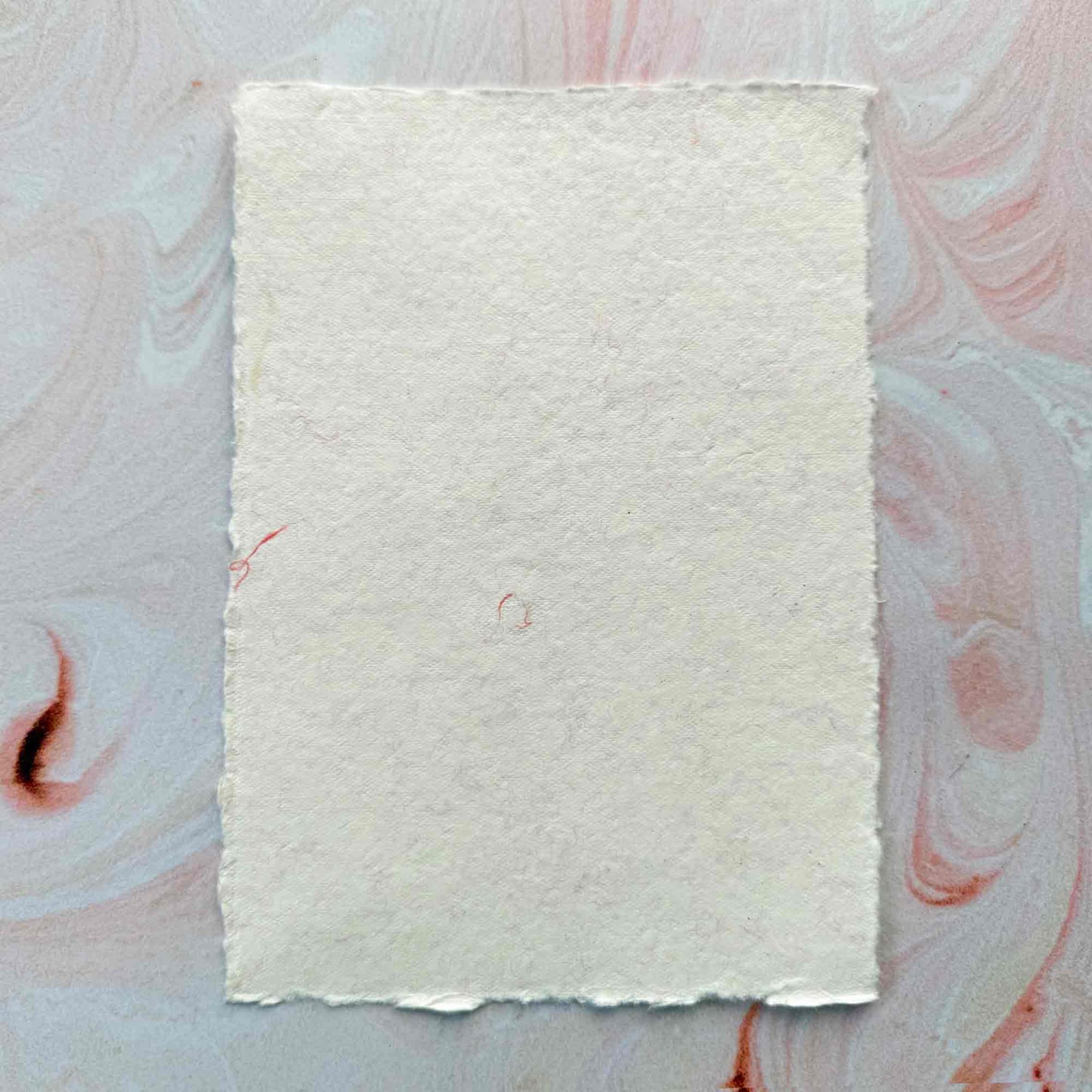 deckled edge handmade paper with pretty wool fibre detailing