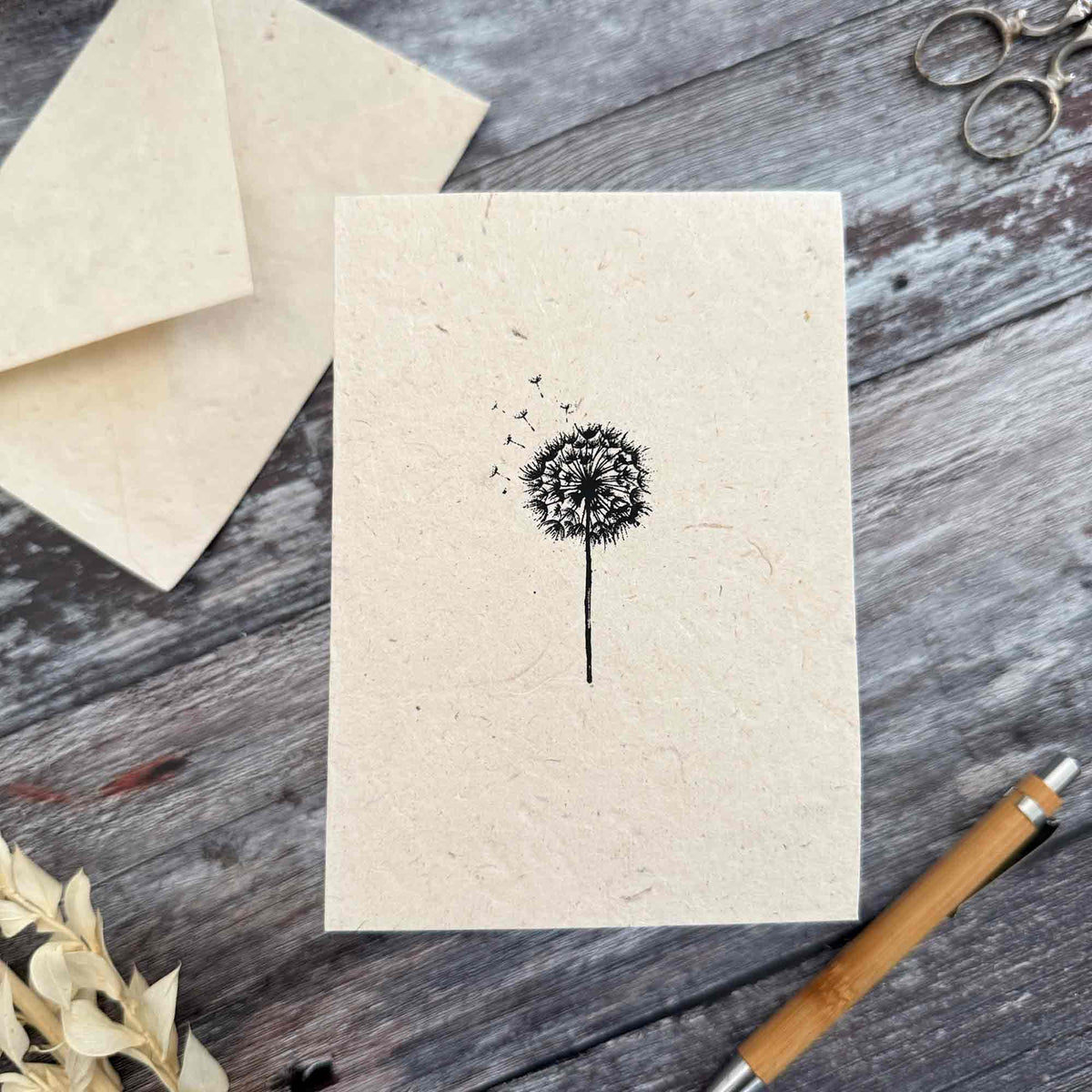 A6 dandelion greeting card with black screen printed dandelion clock on handmade Lokta paper