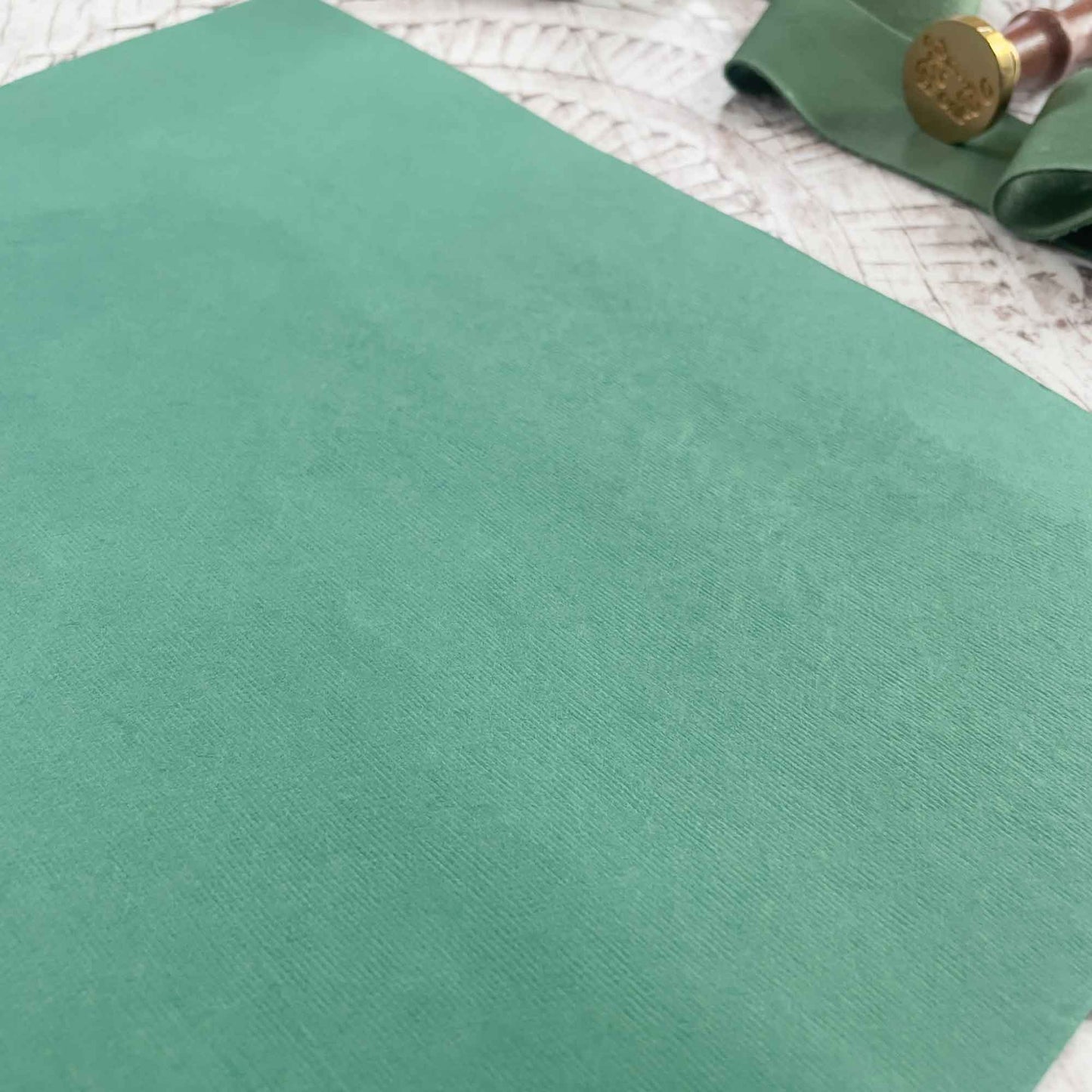 A4 sheet of green recycled cotton rag paper