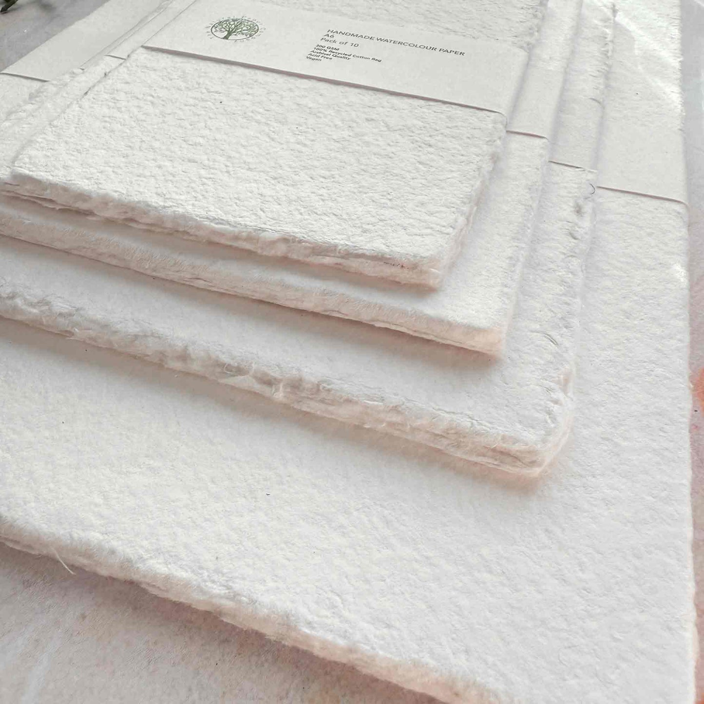 textured watercolour paper with a deckled edge