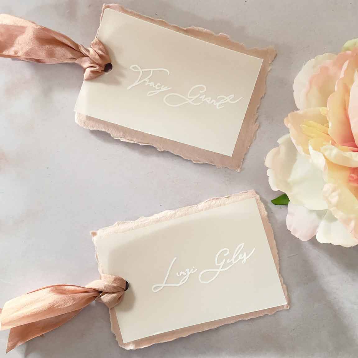 wedding name cards with vellum, handmade paper and silk ribbon