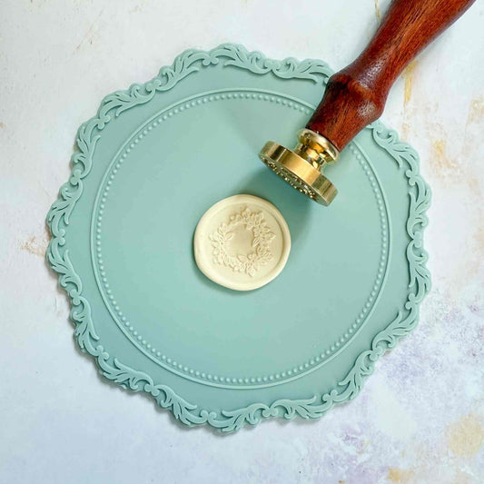 Silicone wax seal mat in dusky blue.  Non stick mat for making wax seals.