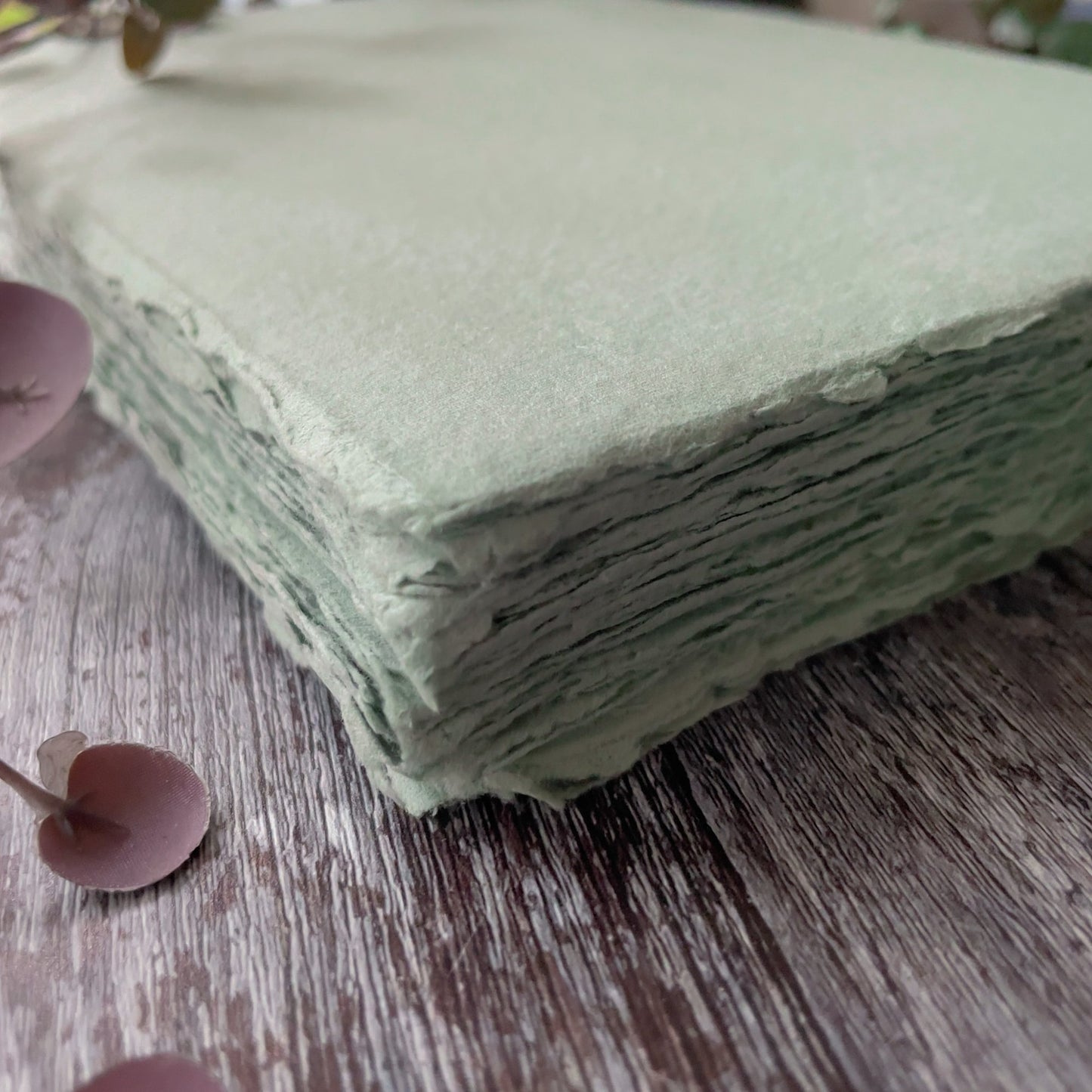 Dusky green handmade paper with a deckled edge.  Recycled cotton rag paper in sage green.  Perfect watercolour paper.  Wonderful for invitations.  By The Natural paper Company