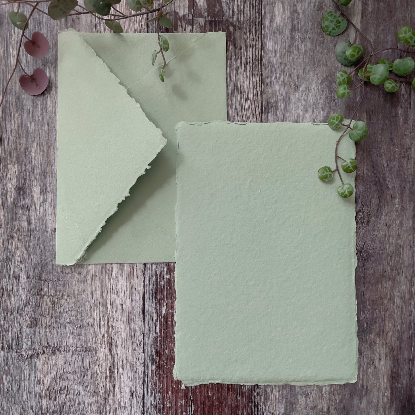 Handmade paper and envelope for invitations.  Dusky green recycled handmade card and envelope with deckled edges.  By The Natural paper Company