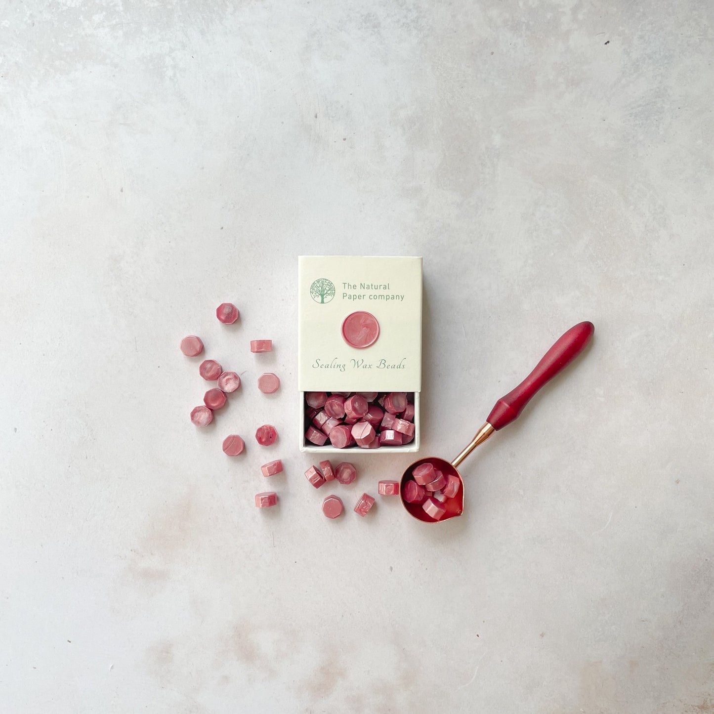 Dusky pink sealing wax beads to make wax seals.  Box of eco friendly wax for wax stamping.  By The Natural paper Company