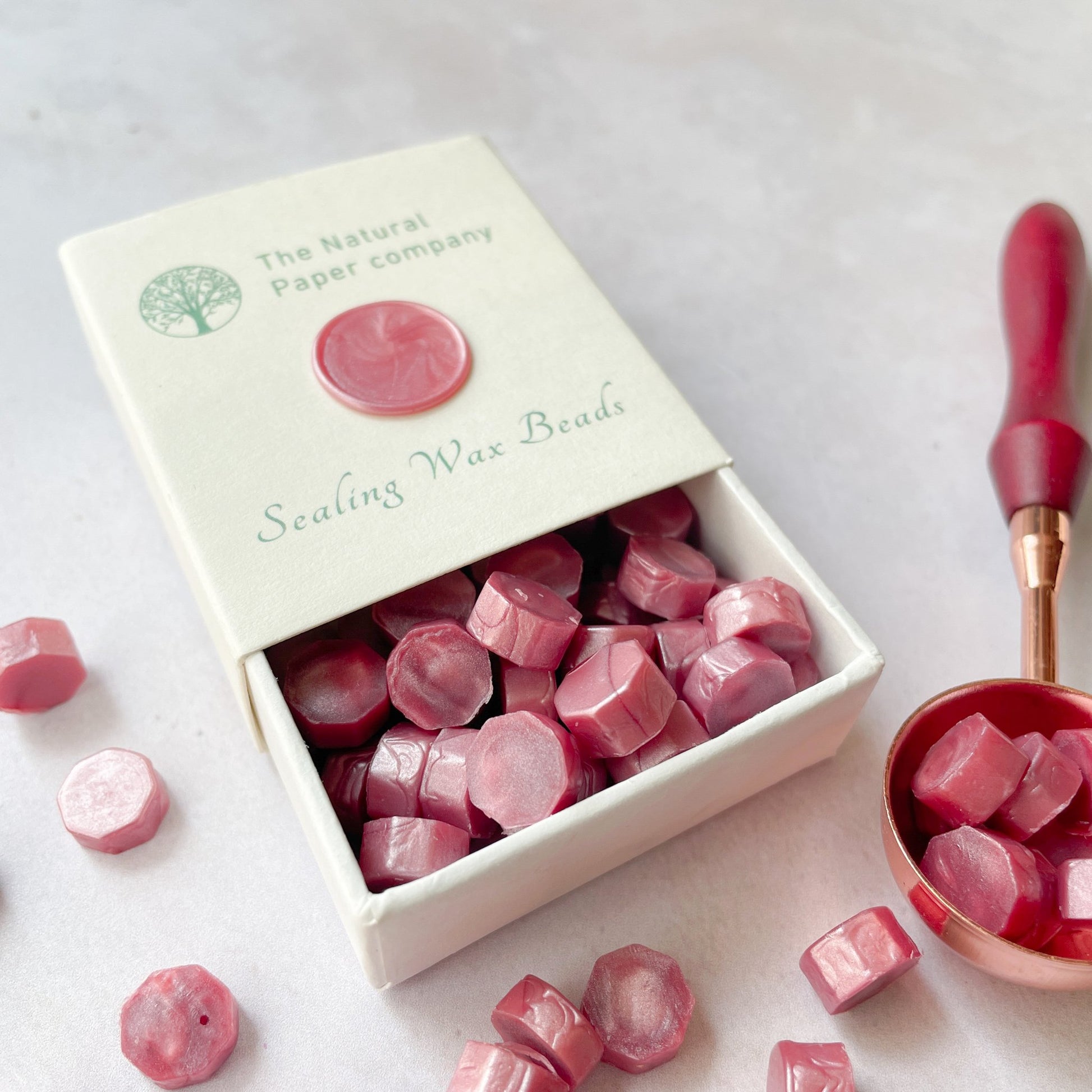 Sealing wax beads in dusky pink colour.  Box of wax to make wax seals in dusky pink.  Eco friendly, plastic free, paraffin free and biodegradable wax.  By The Natural paper Company