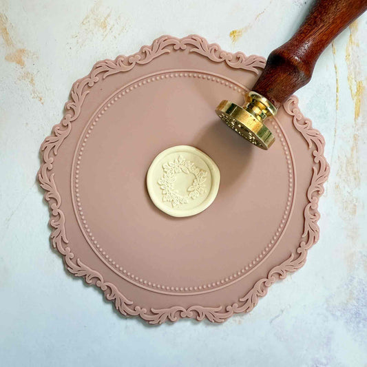 non stick silicon wax seal mat in dusky pink.  
