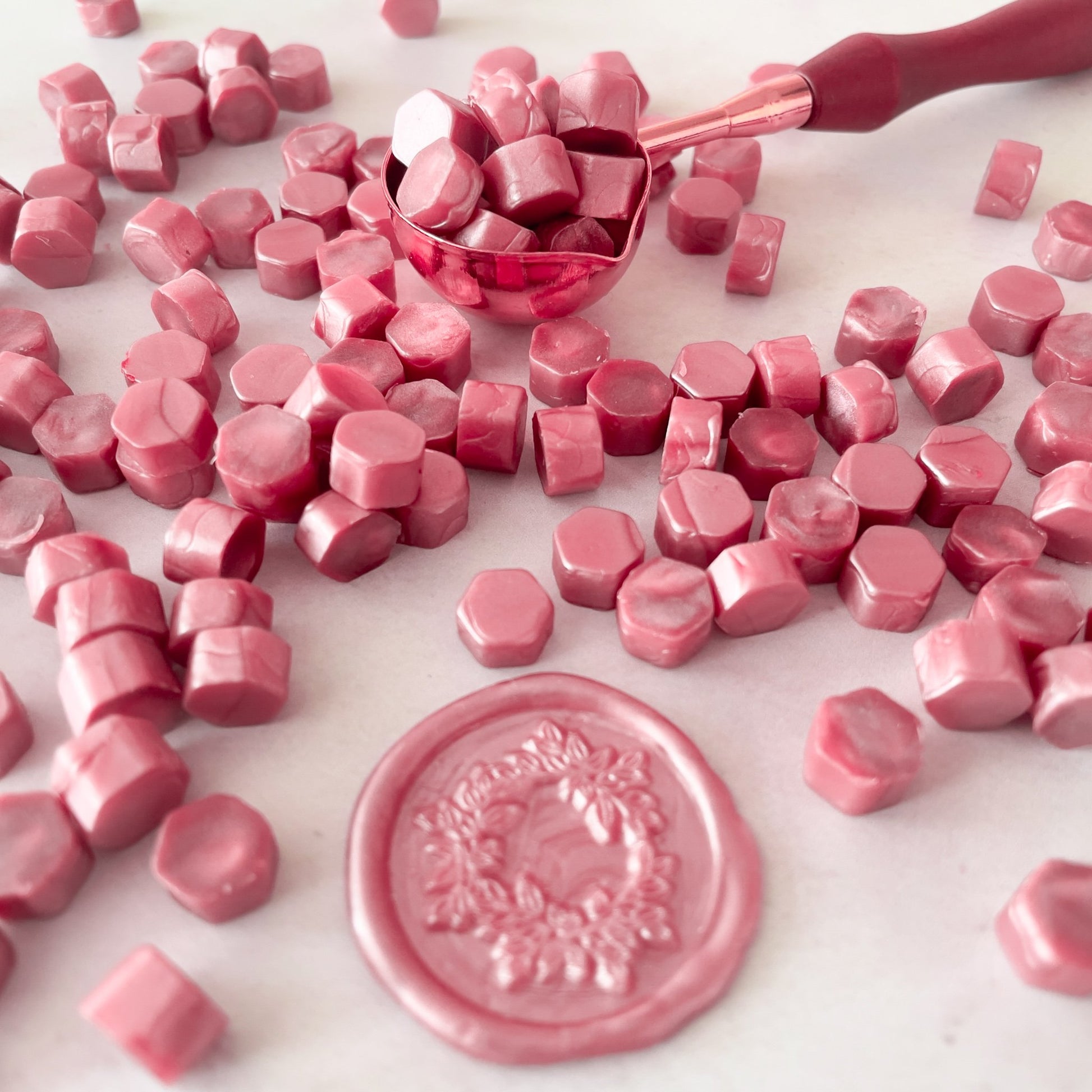 Dusky pink sealing wax beads to make wax seals.  Pretty wax made from natural ingredients.  Plastic free, paraffin free and biodegradable.  by The Natural Paper Company