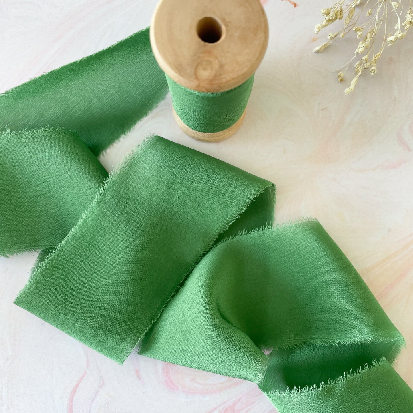 Luxury silk ribbon for crafts.  Emerald green silk ribbon for floristry and decorating wedding invitations and stationery.  By The Natural Paper Company.