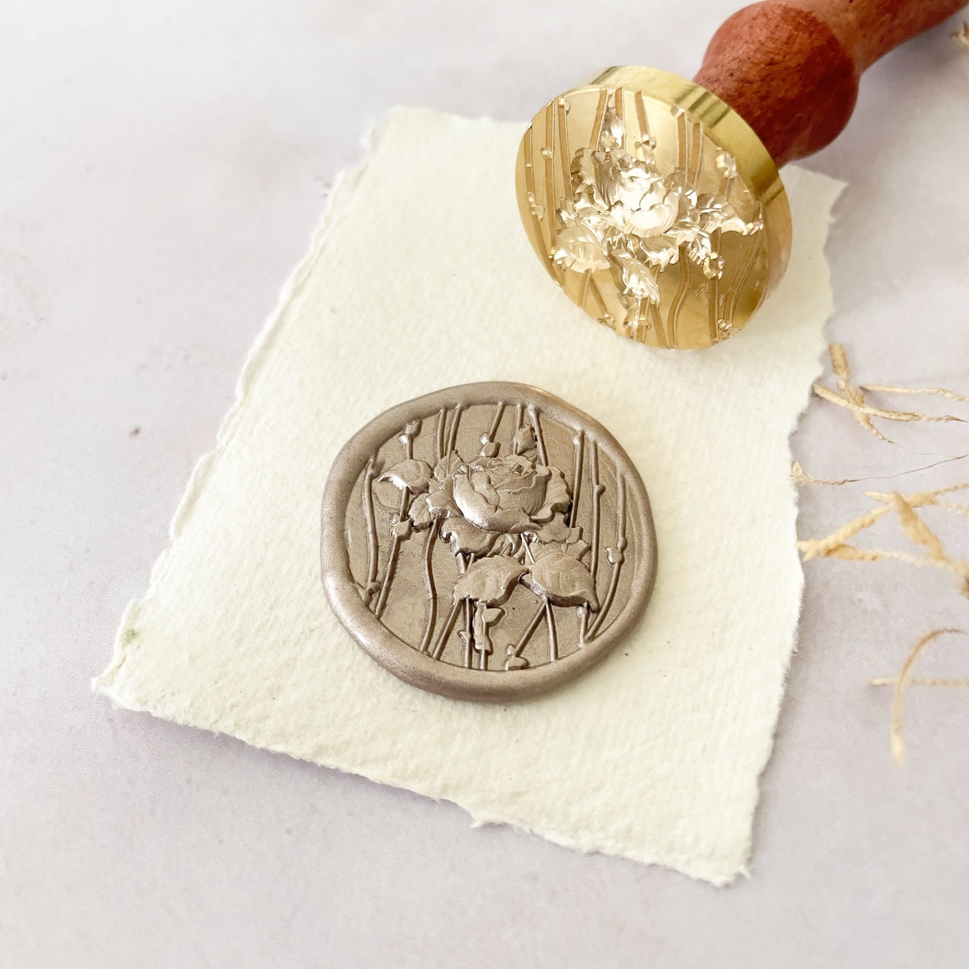 Sealing wax stamp with a rose design.  Bridgerton style sealing wax stamp By The Natural Paper Company