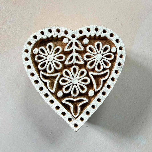 Heart-shaped wooden stamp with floral patterns 