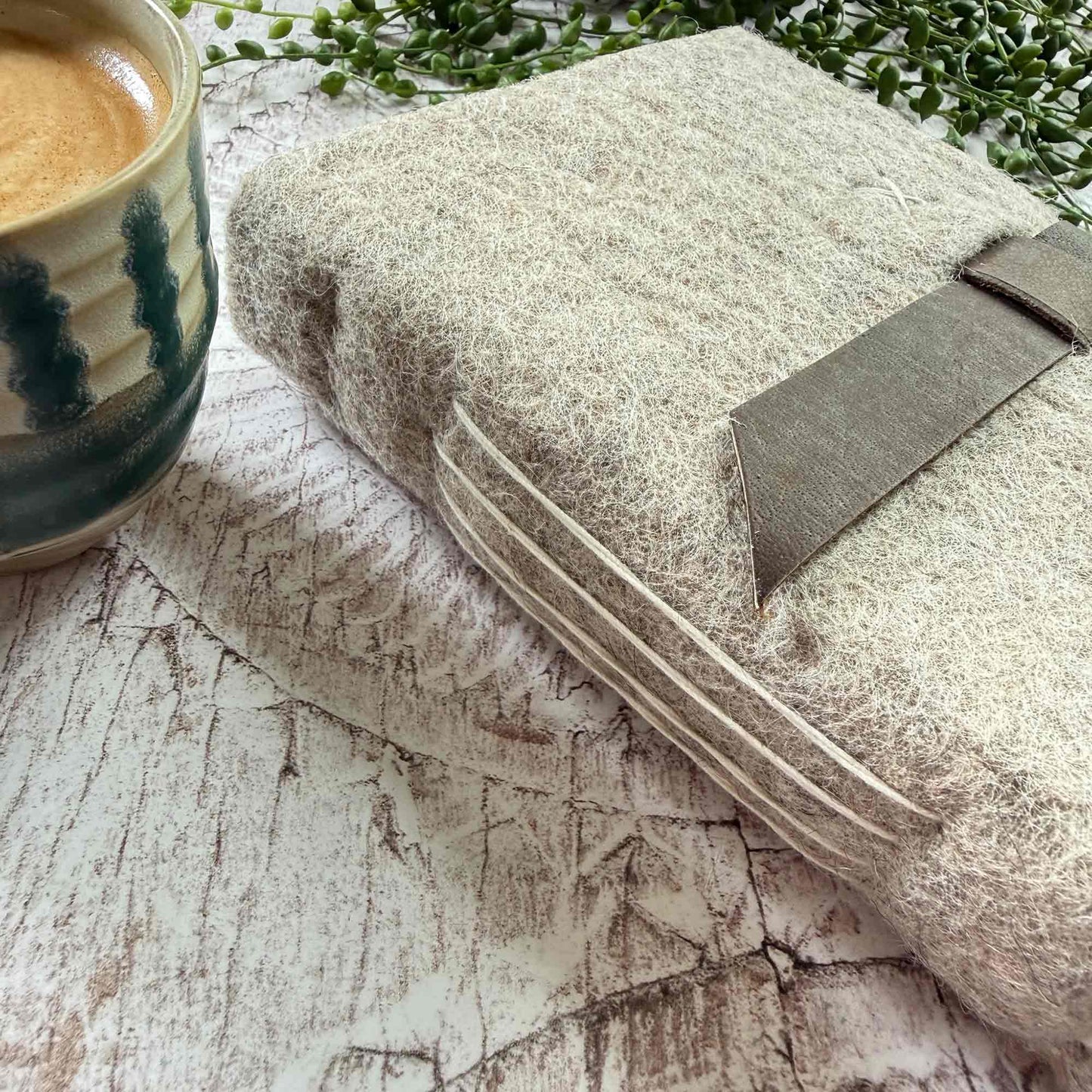 Handcrafted Lokta paper notebook, sustainable materials, A5 size, natural felted wool cover with hand stitched detailing