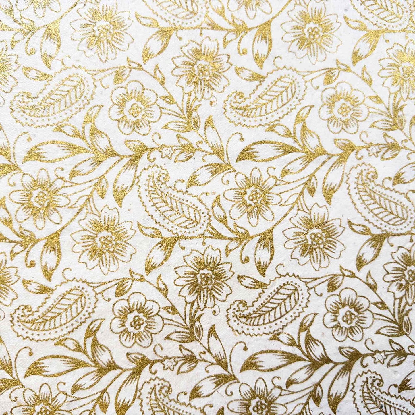 handmade lokta paper gift wrap with gold flowers