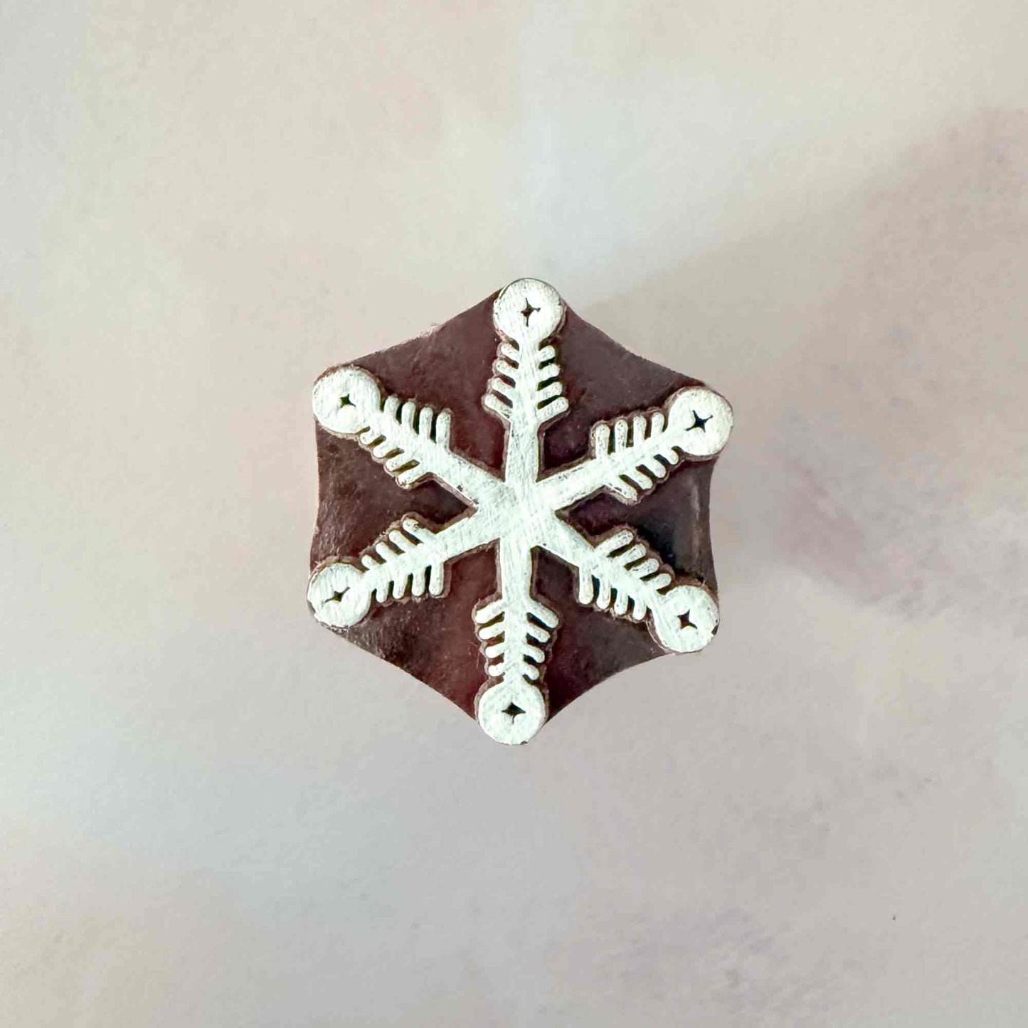 indian wood block stamp with small snowflake design