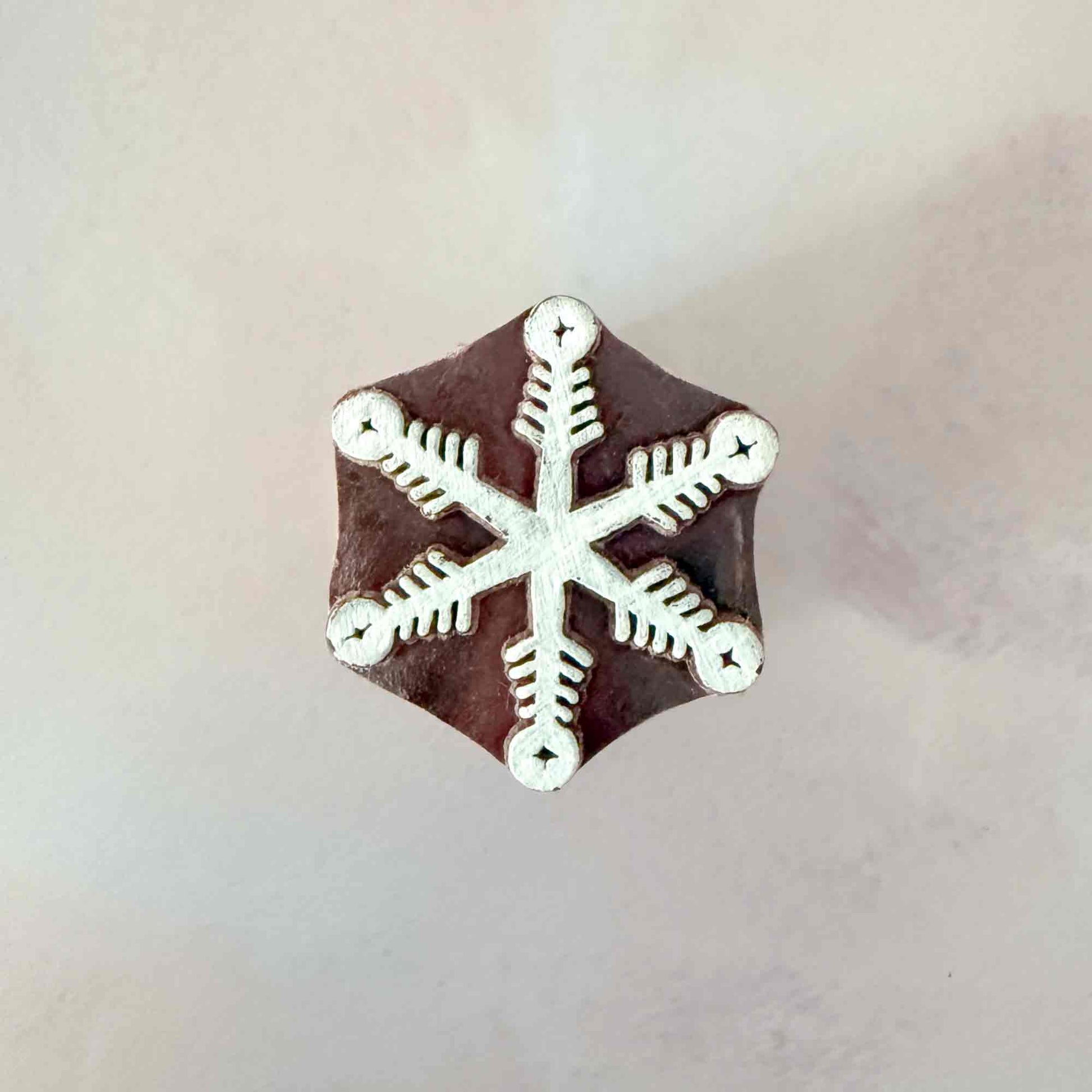 indian wood block stamp with small snowflake design
