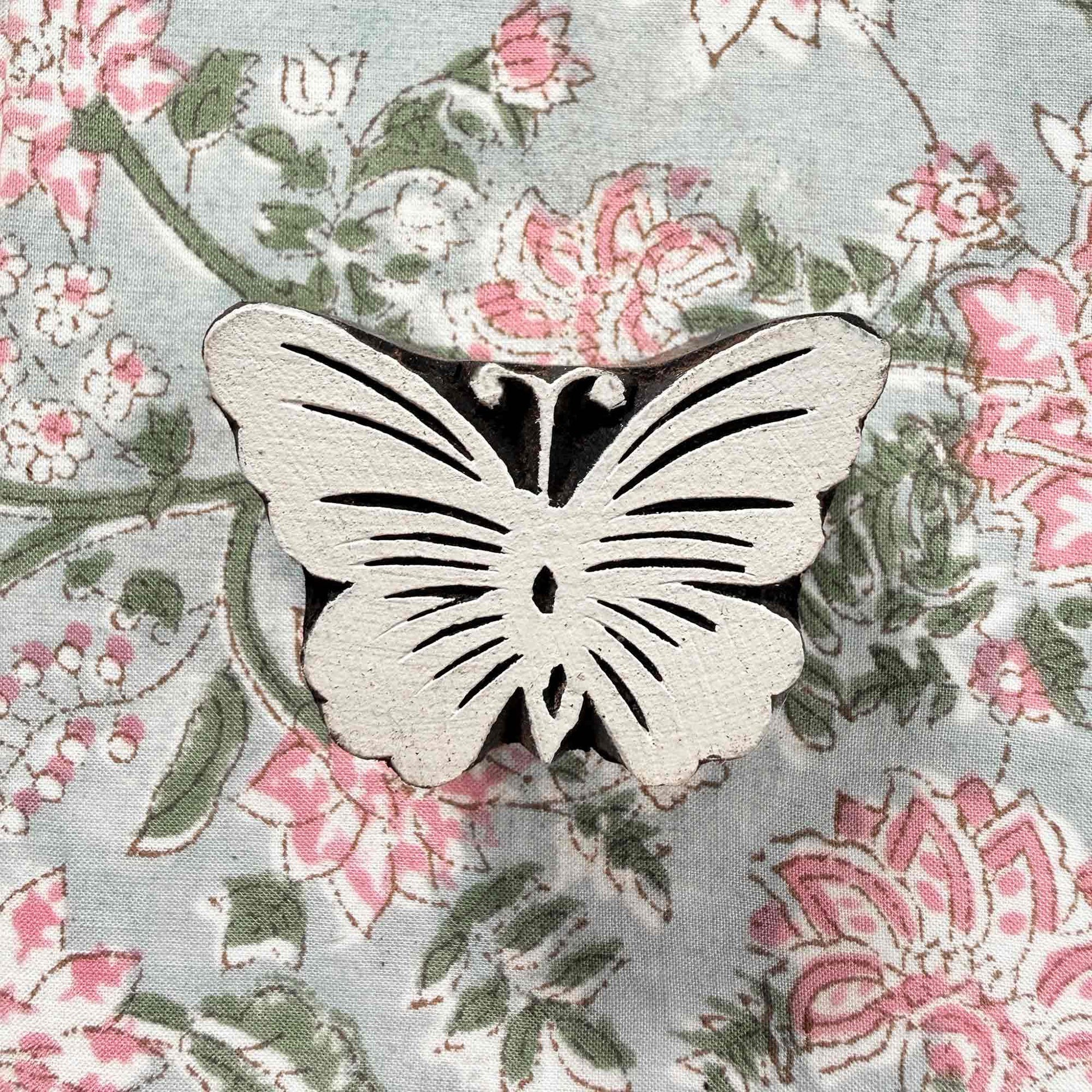 butterlfy design indian wood block stamp on a block printed fabric