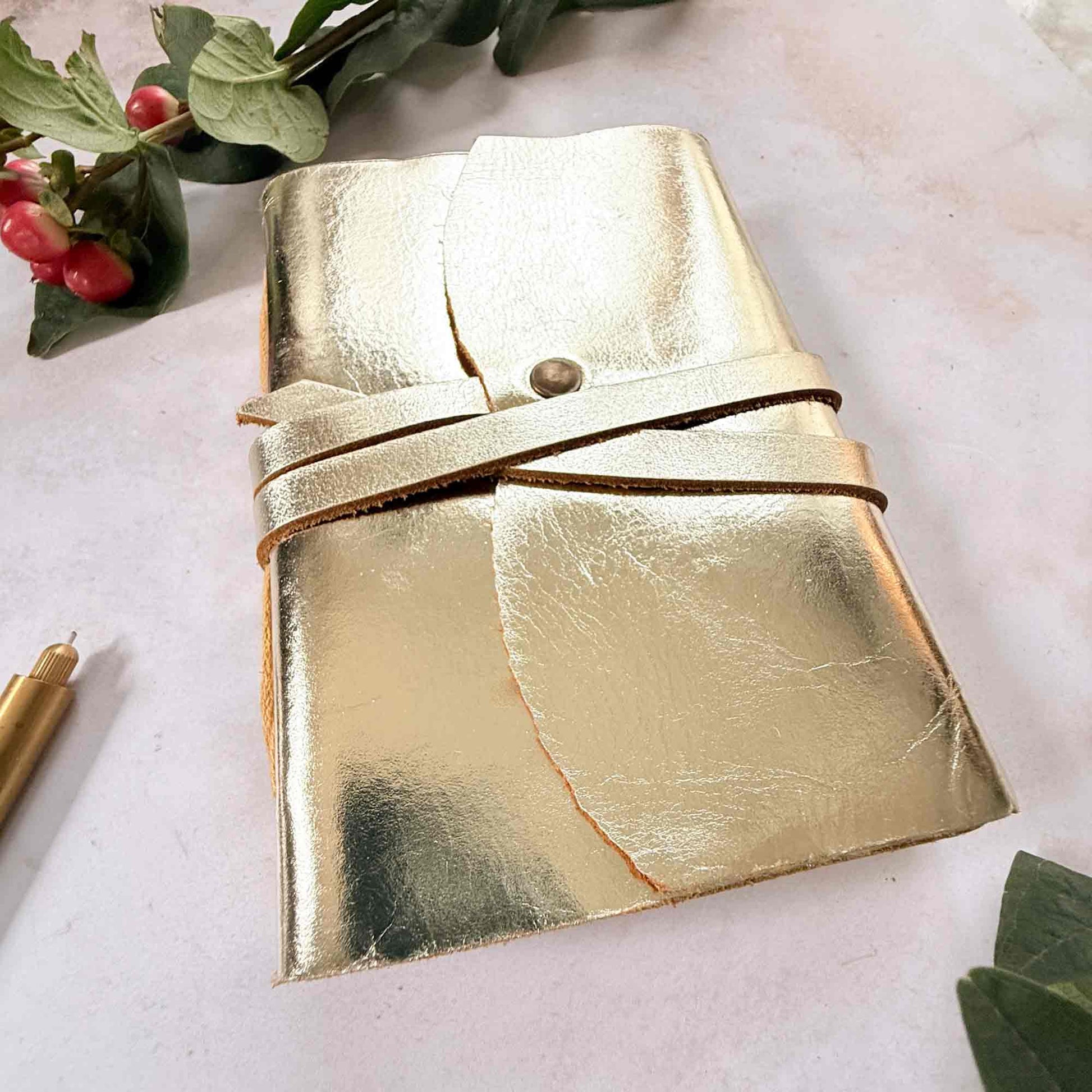 gold leather bound notebook