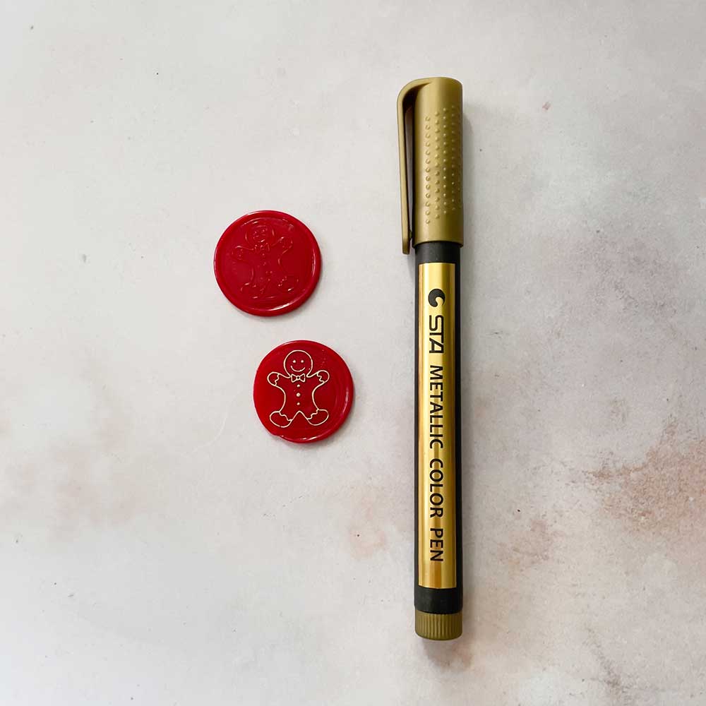Metallic gold highlighter pen for decorating wax seals.  Add detail to your sealing wax stamps with a metallic gold marker By The Natural Paper Company