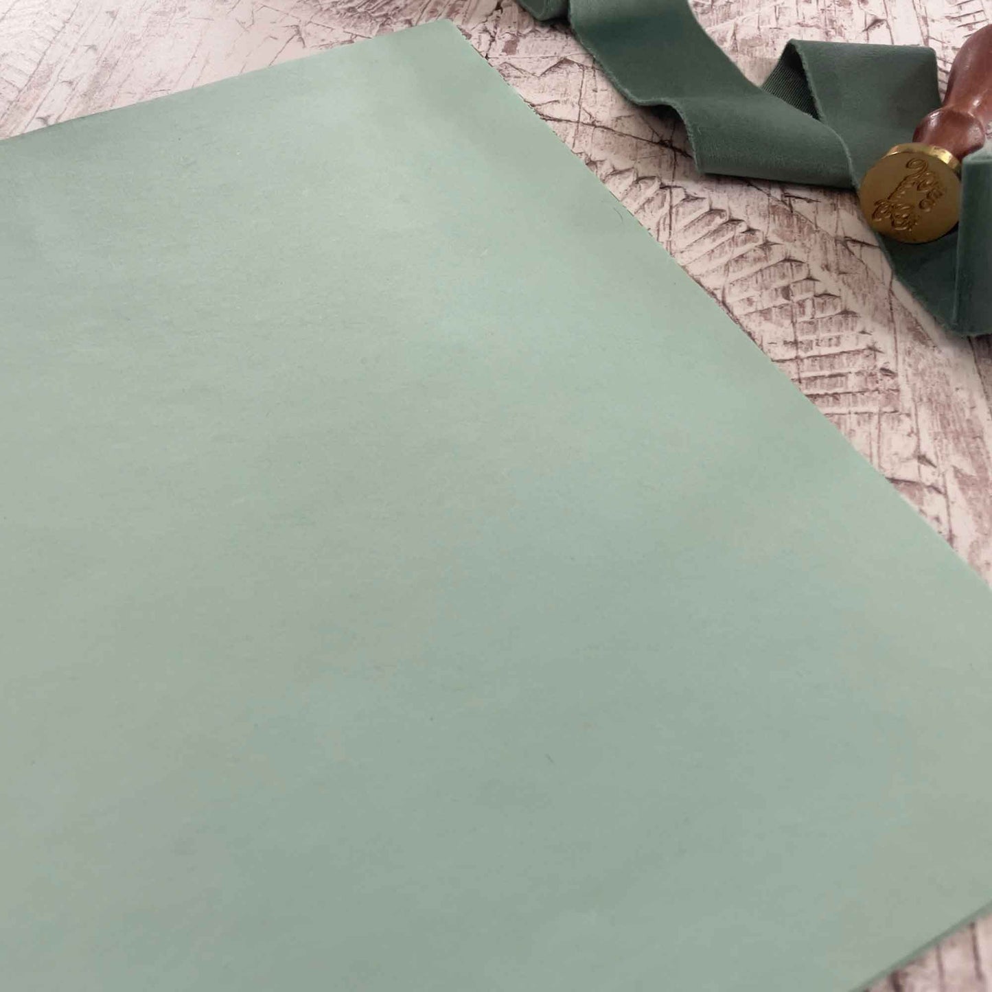 Light green recycled cotton rag paper in A4 sheets