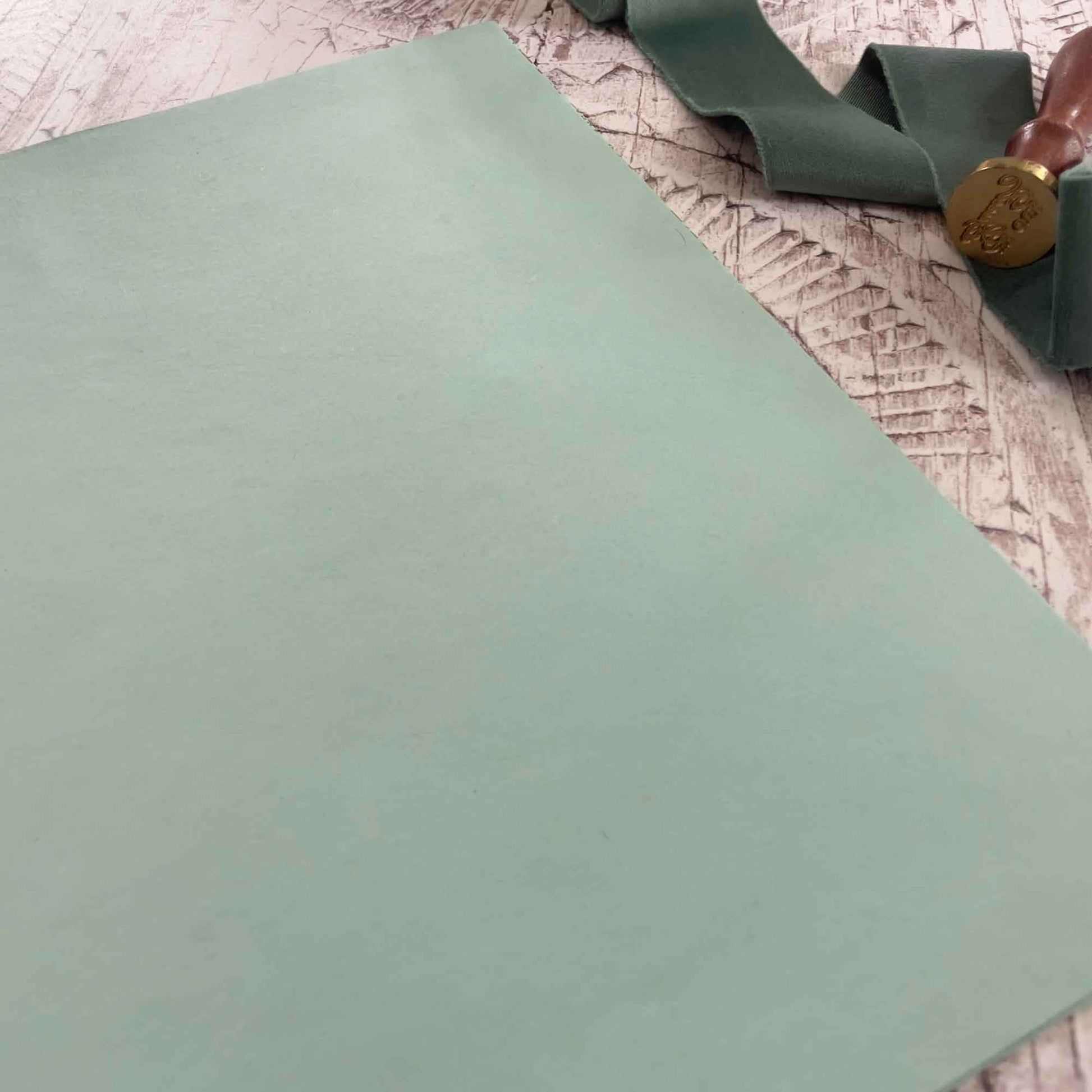 Light green recycled cotton rag paper in A4 sheets