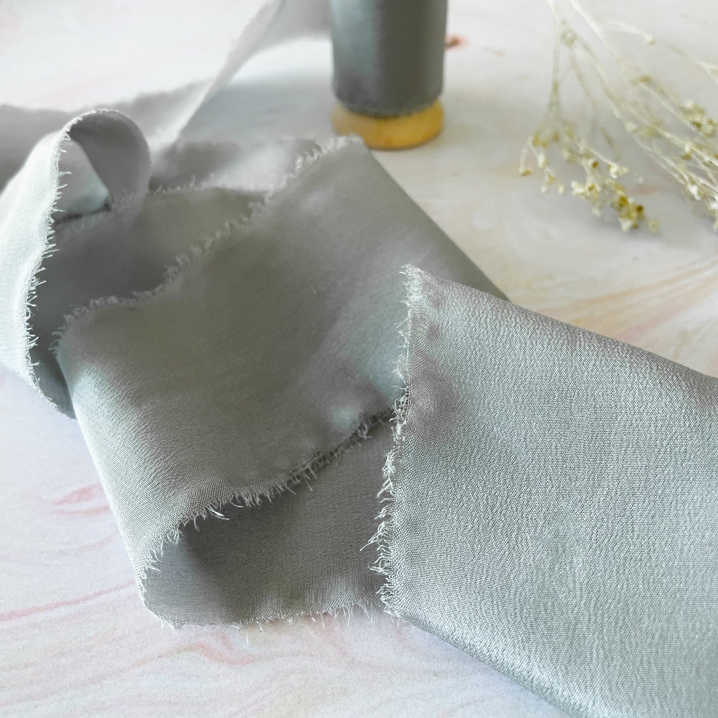 Grey Silk Ribbon with a frayed edge.  Habotai silk ribbon for crafts.  By The Natural Paper Company