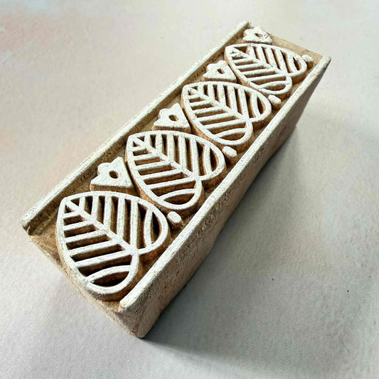 Wooden stamp with leaf patterns 