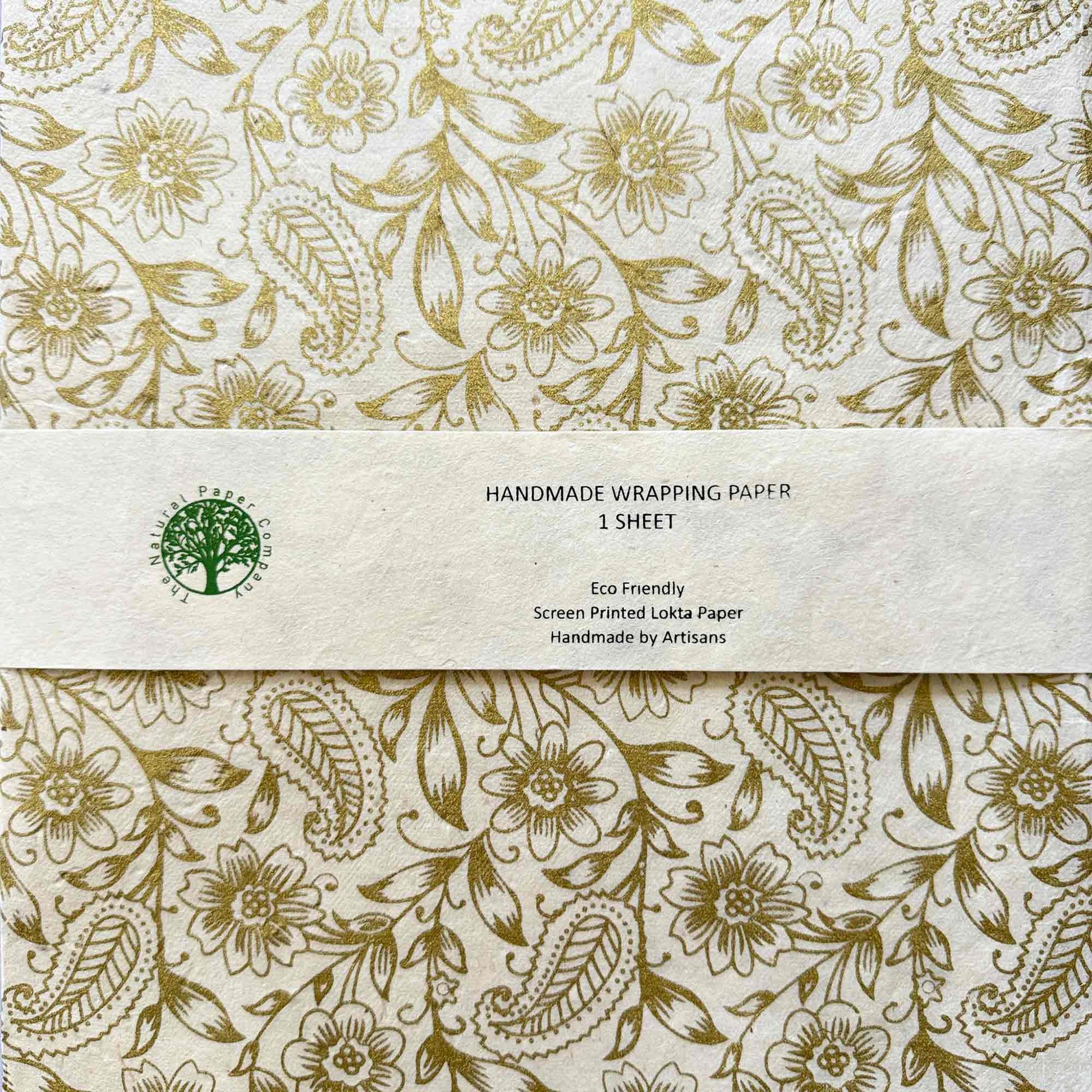Eco-friendly handmade Lokta wrapping paper, gold floral paisley print, artisan screen printed
