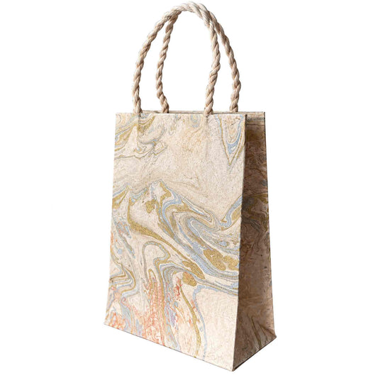 Small Midas Marble handmade Lokta paper gift bag with gold, soft blue and blush pink marbled pattern and natural rope handles.