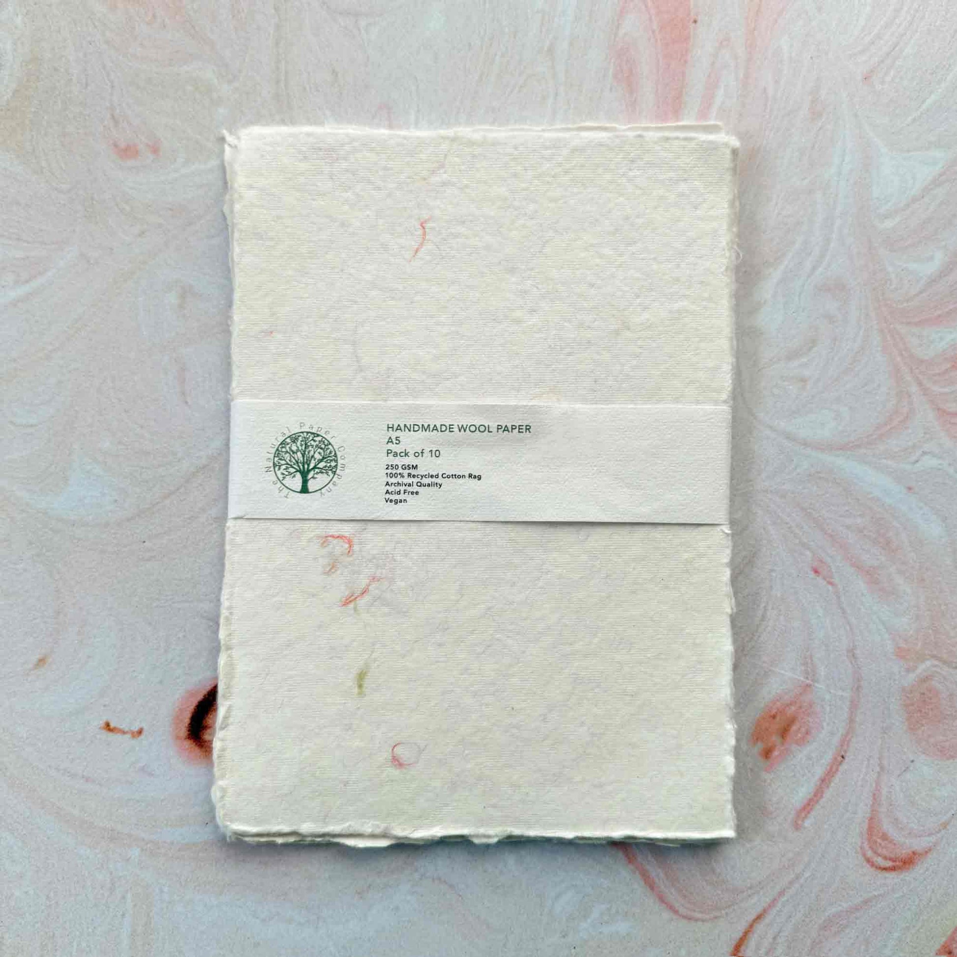 pack of A5 handmade paper with decorative wool fibres