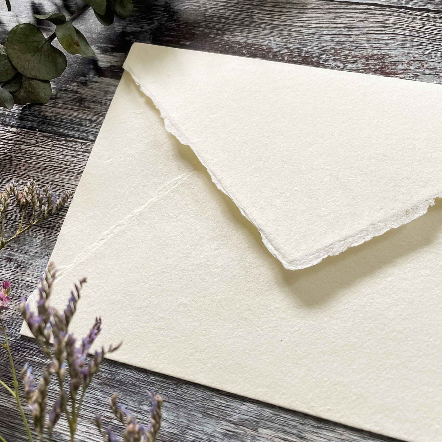 Ivory handmade paper envelope with a deckled edge.  Invitation envelope made from handmade paper.  By The Natural Paper Company