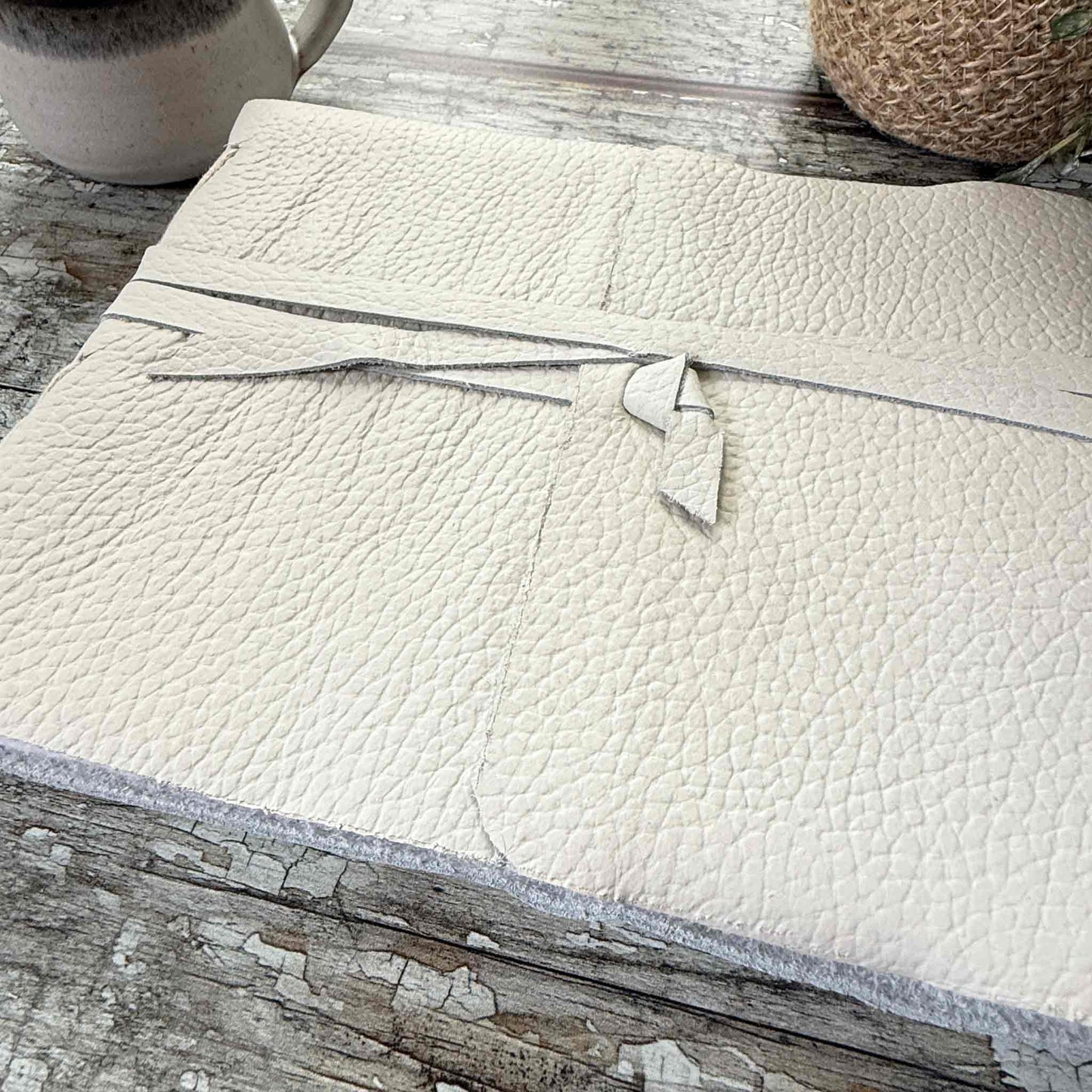 handmade journal with a soft ivory leather cover