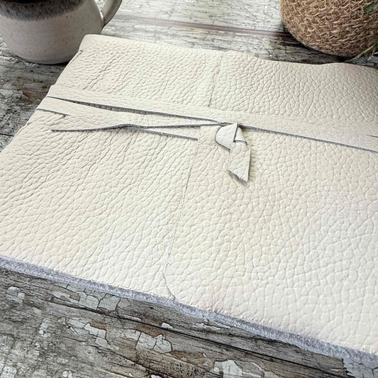 handmade journal with a soft ivory leather cover