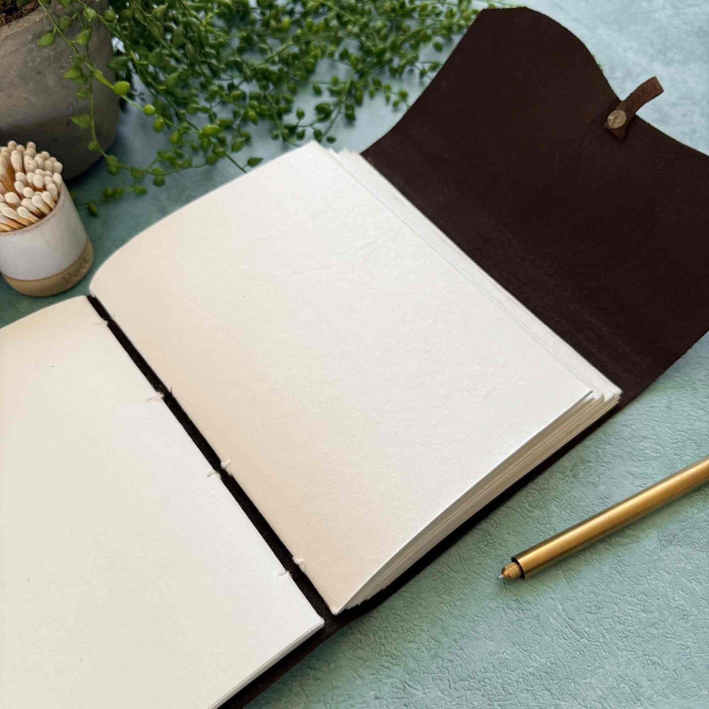 handmade leather journal with blank cotton paper pages