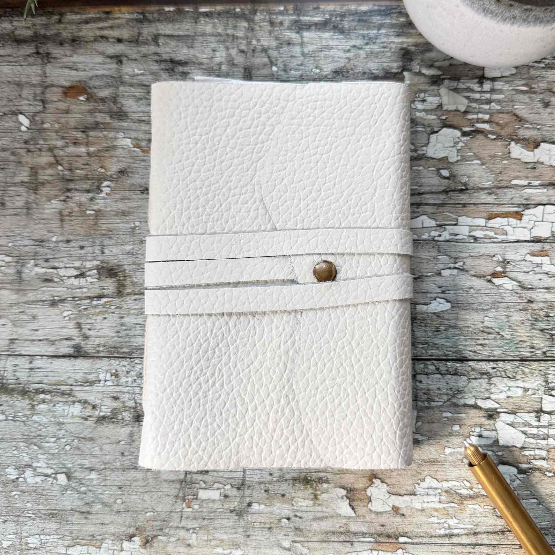 small cream leather notebook with acid free papaer