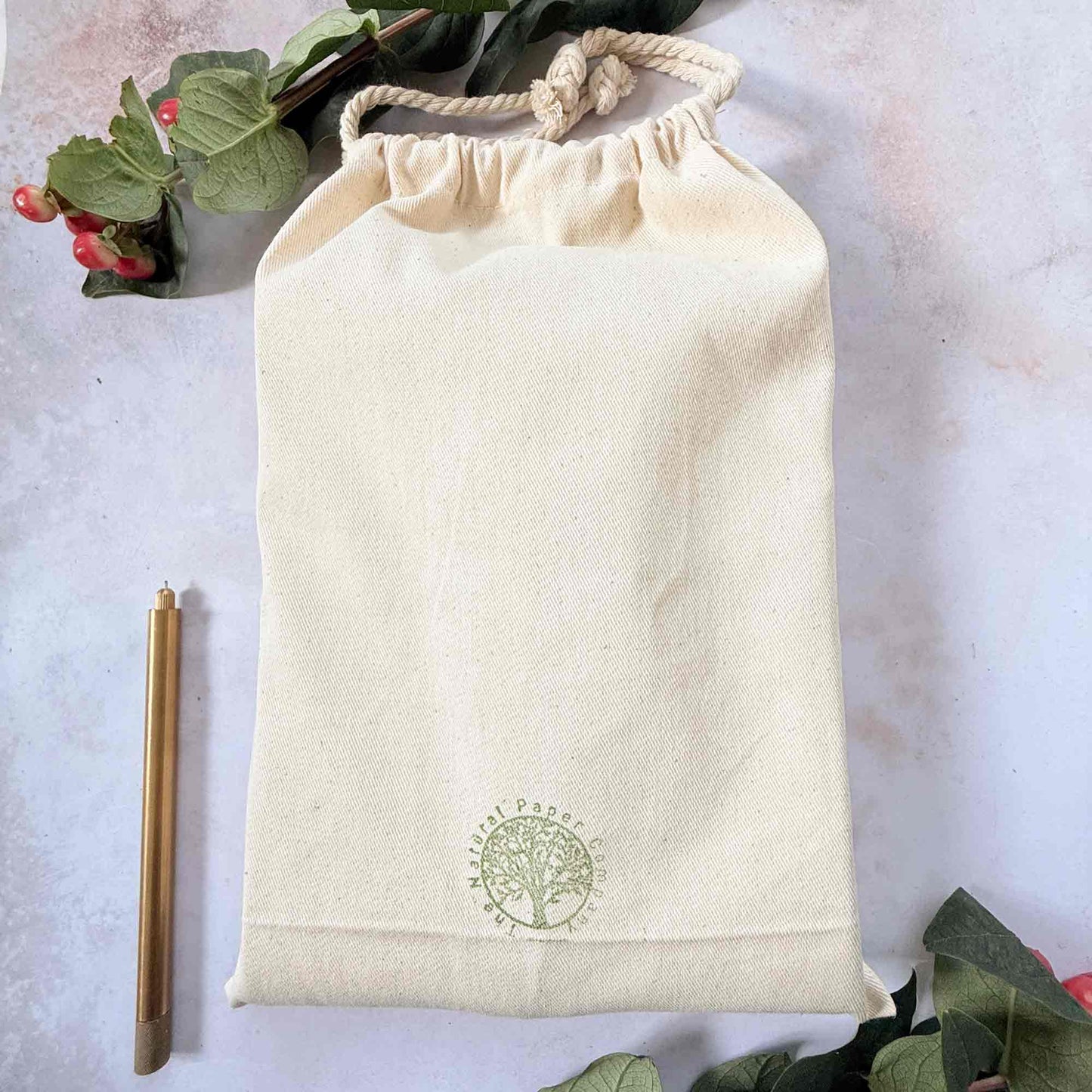 handmade leather journal in a gift bag