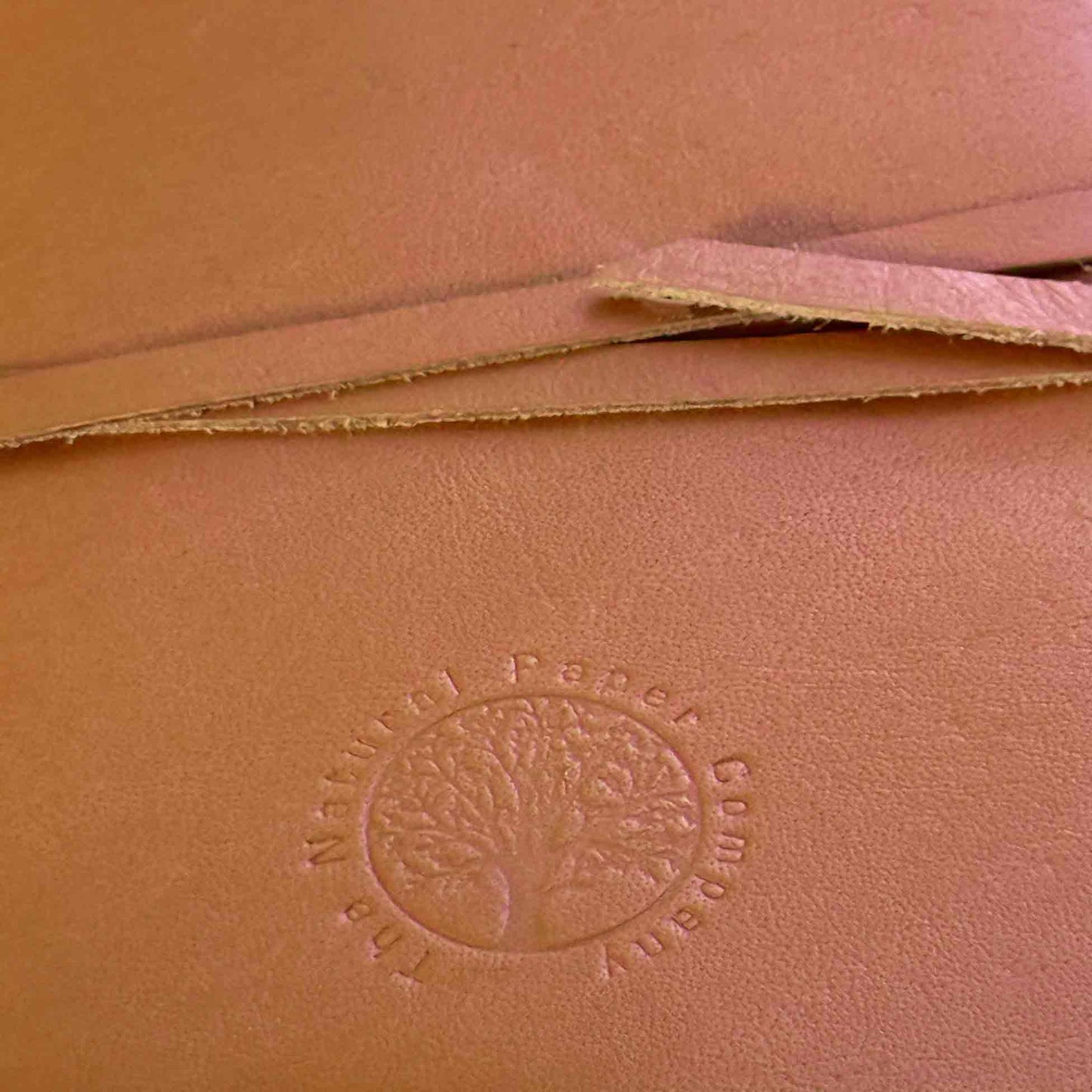 the natural paper company branded handmade leather journals