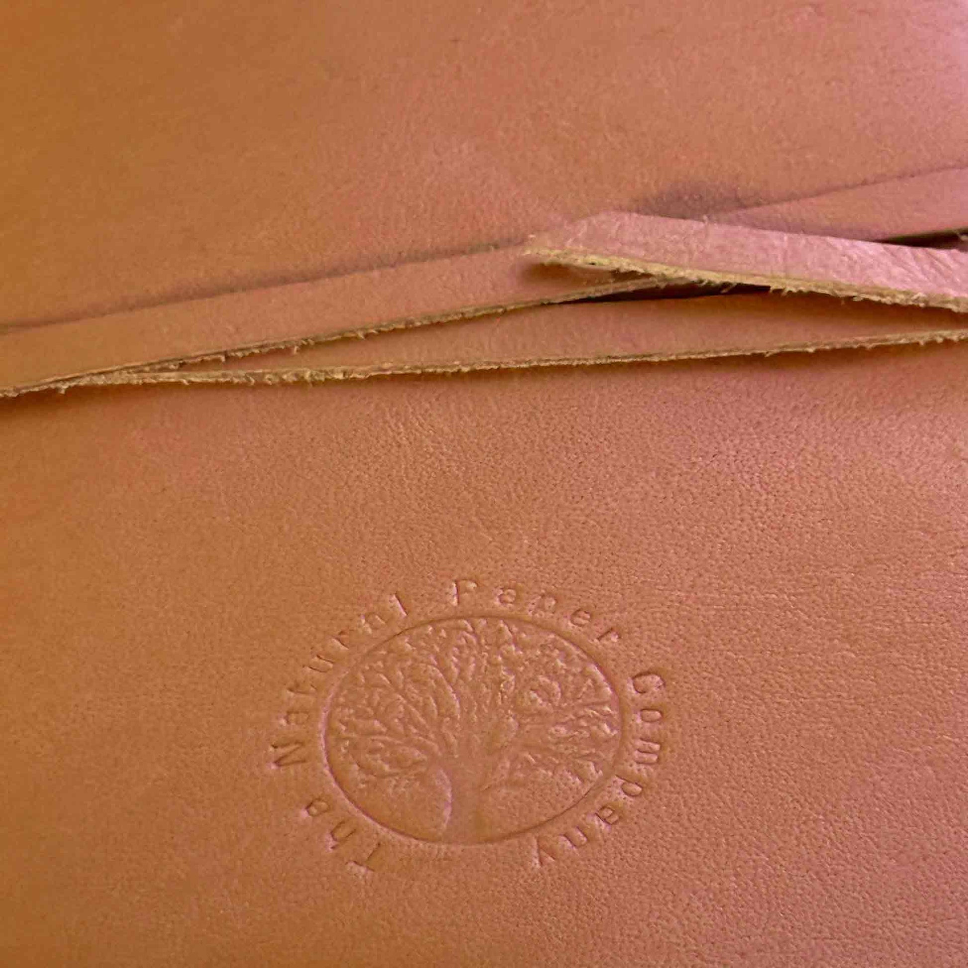 the natural paper company branded handmade leather journals