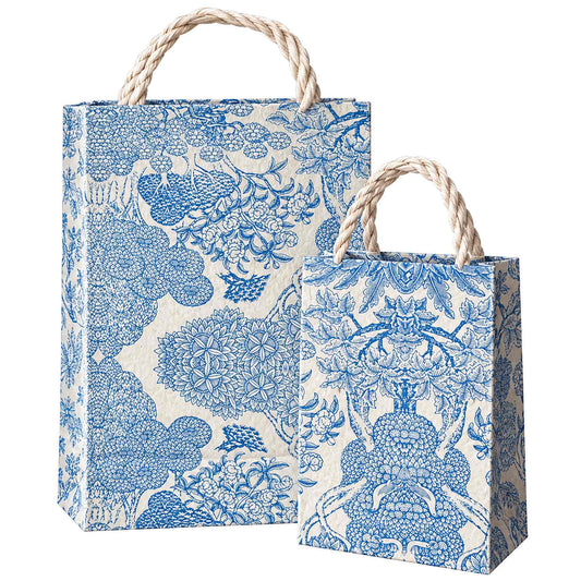 Large and small Niwa Lokta paper gift bags featuring traditional Japanese-inspired blue garden illustrations.