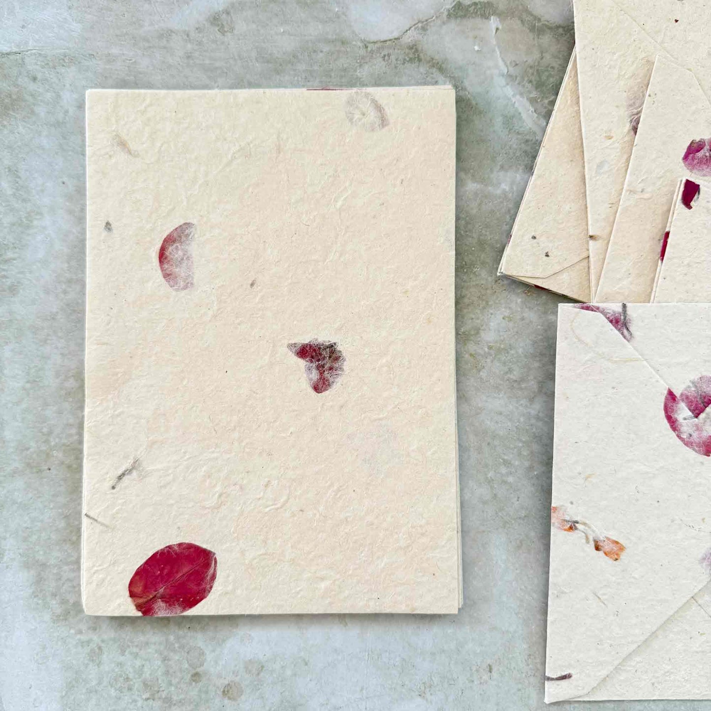 Handmade paper with pressed flowers.  A5 size Nepalese Lokta Paper with bougainvillea petals
