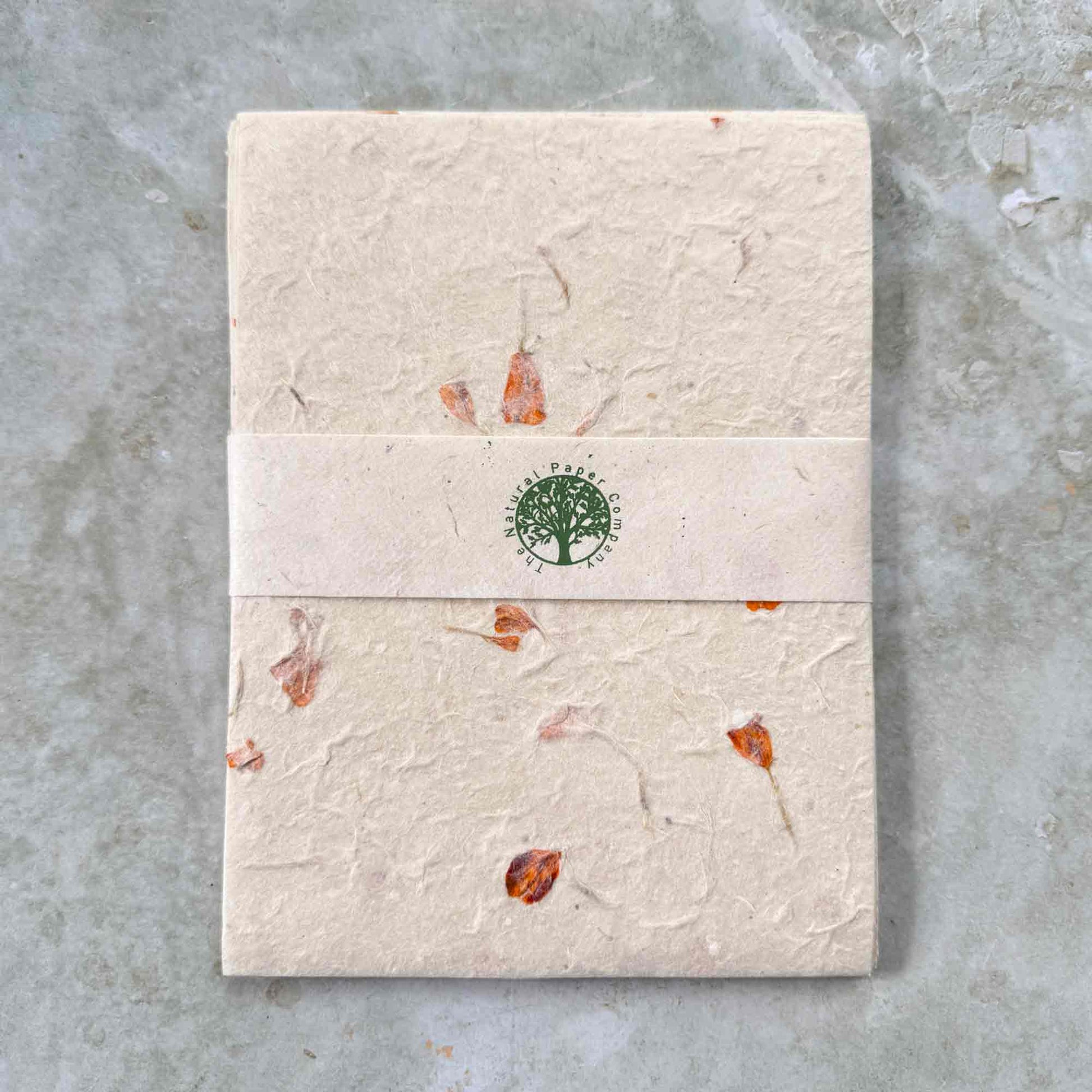 Pack of handmade lokta paper with marigold flowers